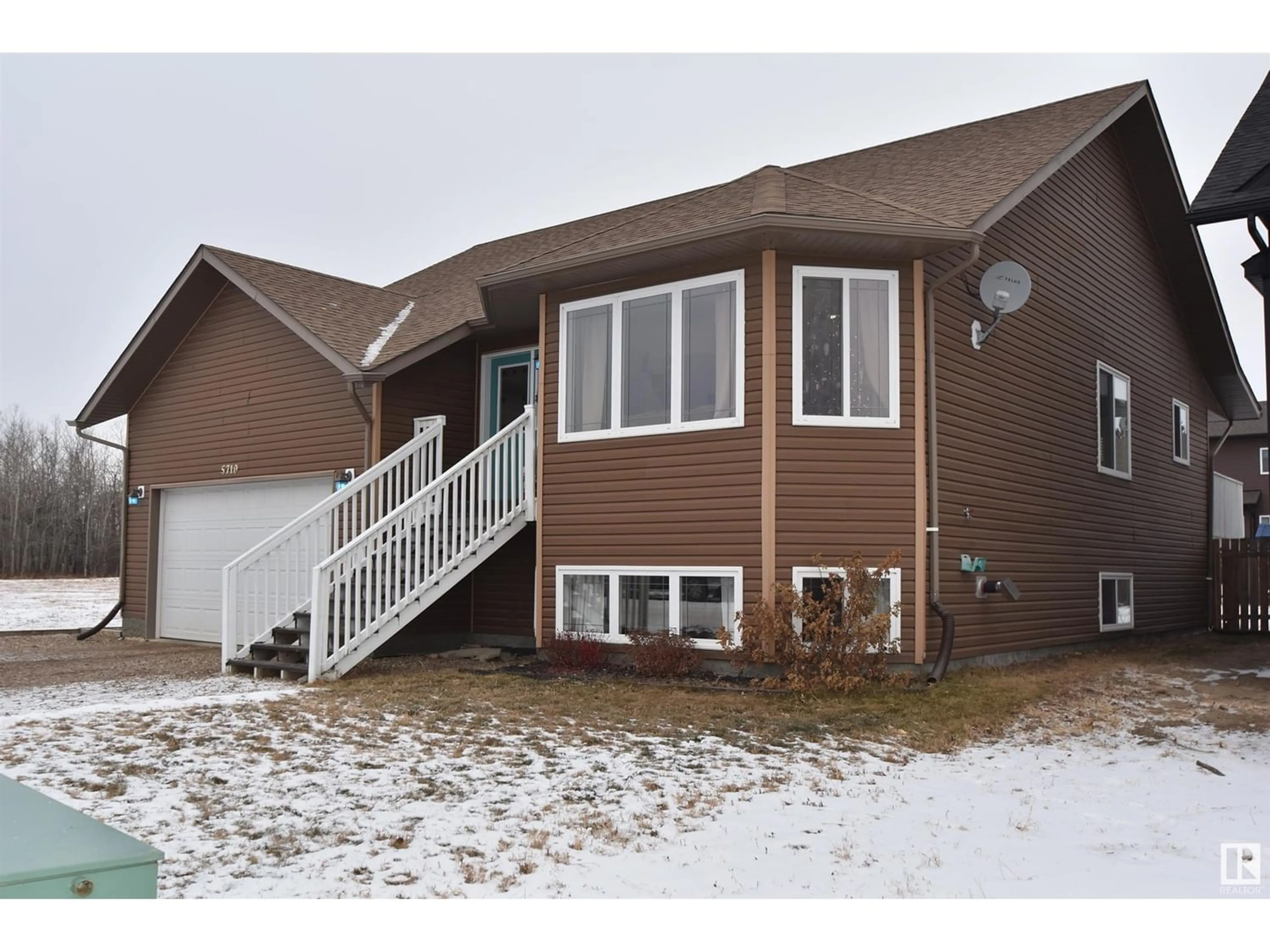 Frontside or backside of a home for 5710 52 AV, St. Paul Town Alberta T0A3A1