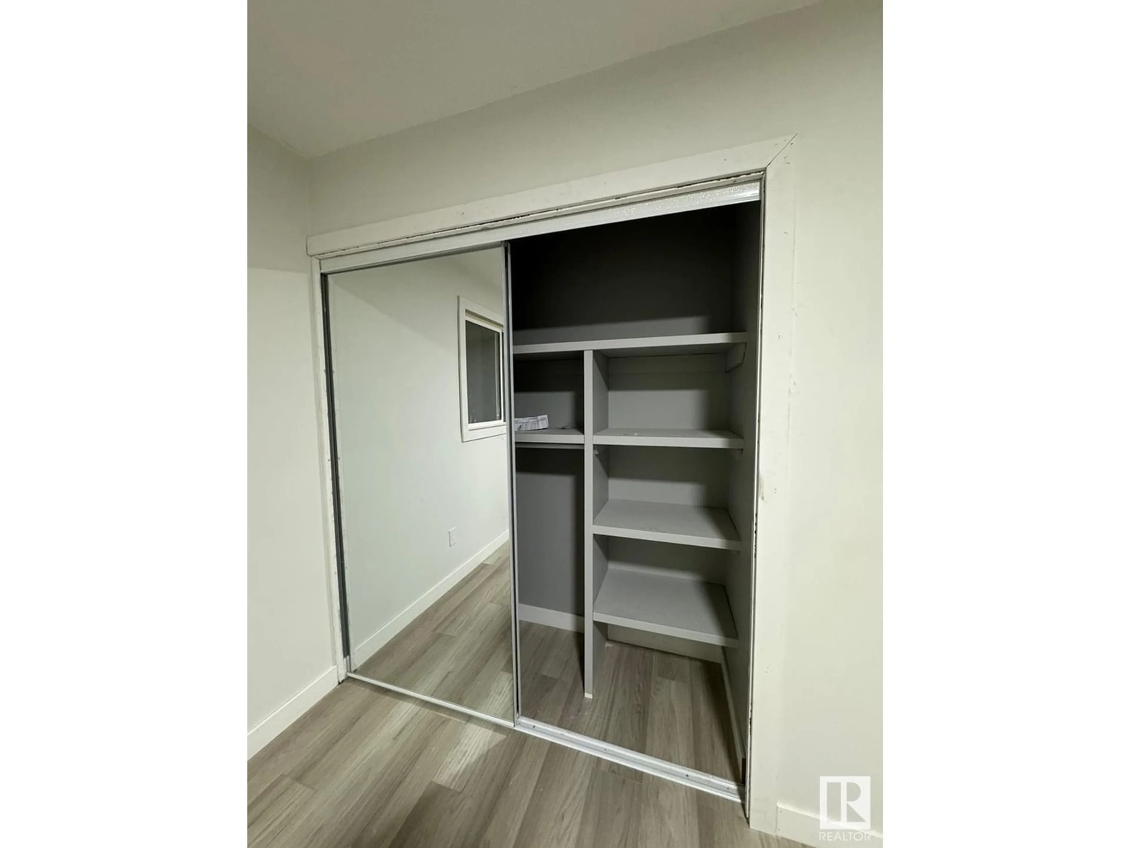 Storage room or clothes room or walk-in closet for 13823 28 ST NW, Edmonton Alberta T5Y1A6
