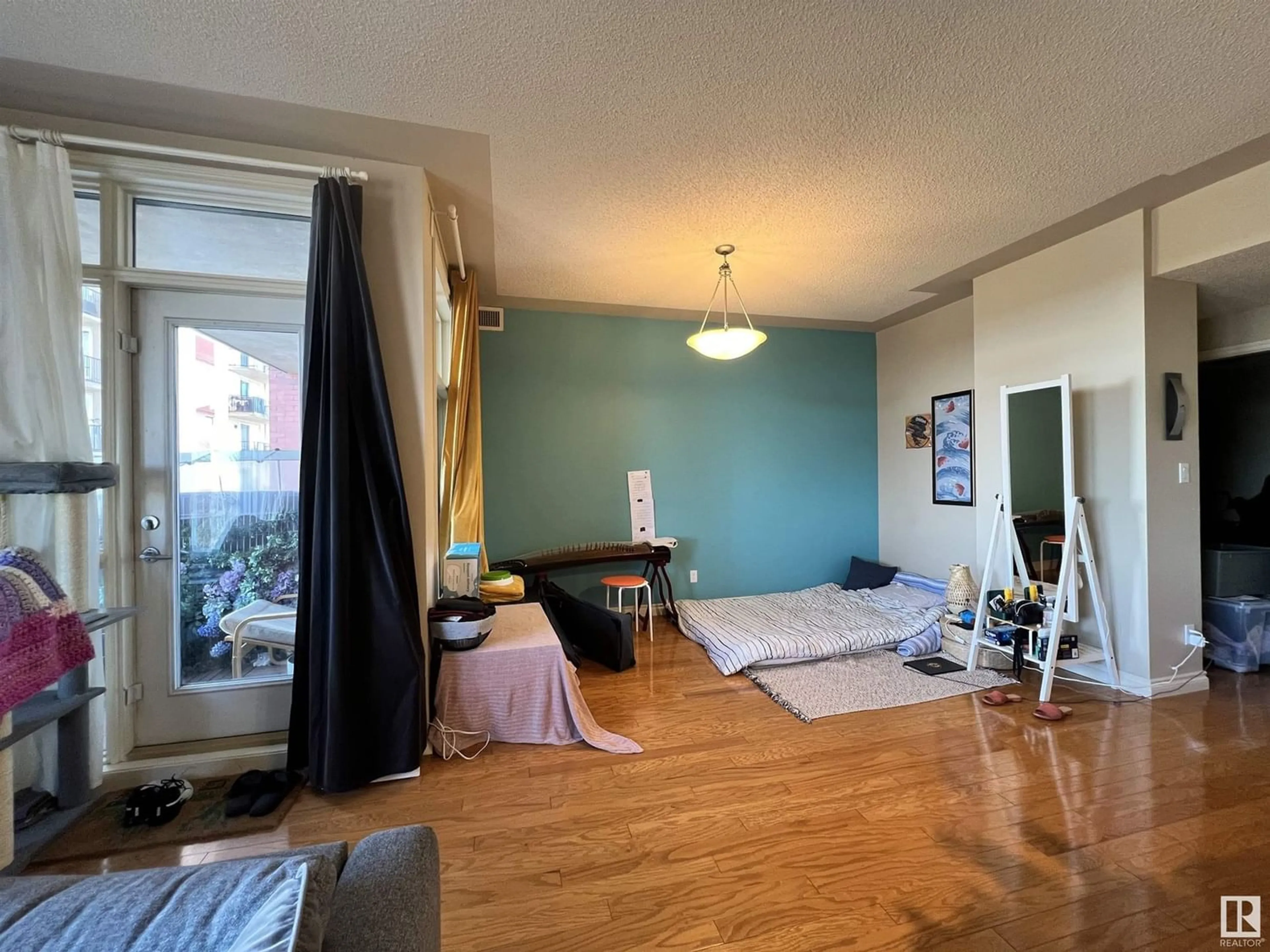 A pic of a room, wood floors for #306 9020 JASPER AV NW, Edmonton Alberta T5H3S8