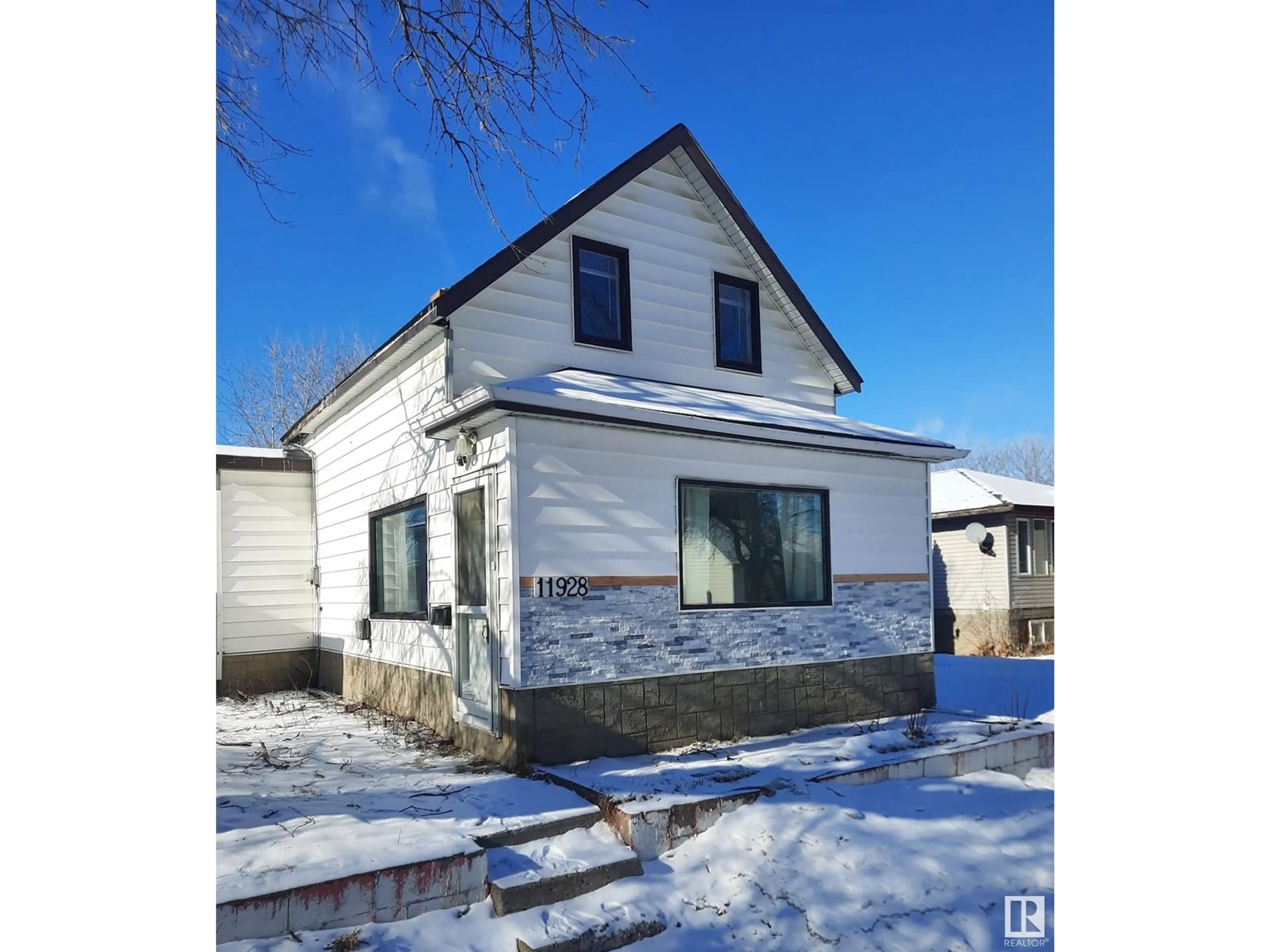 Frontside or backside of a home for 11928 68 ST NW, Edmonton Alberta T5B1P7