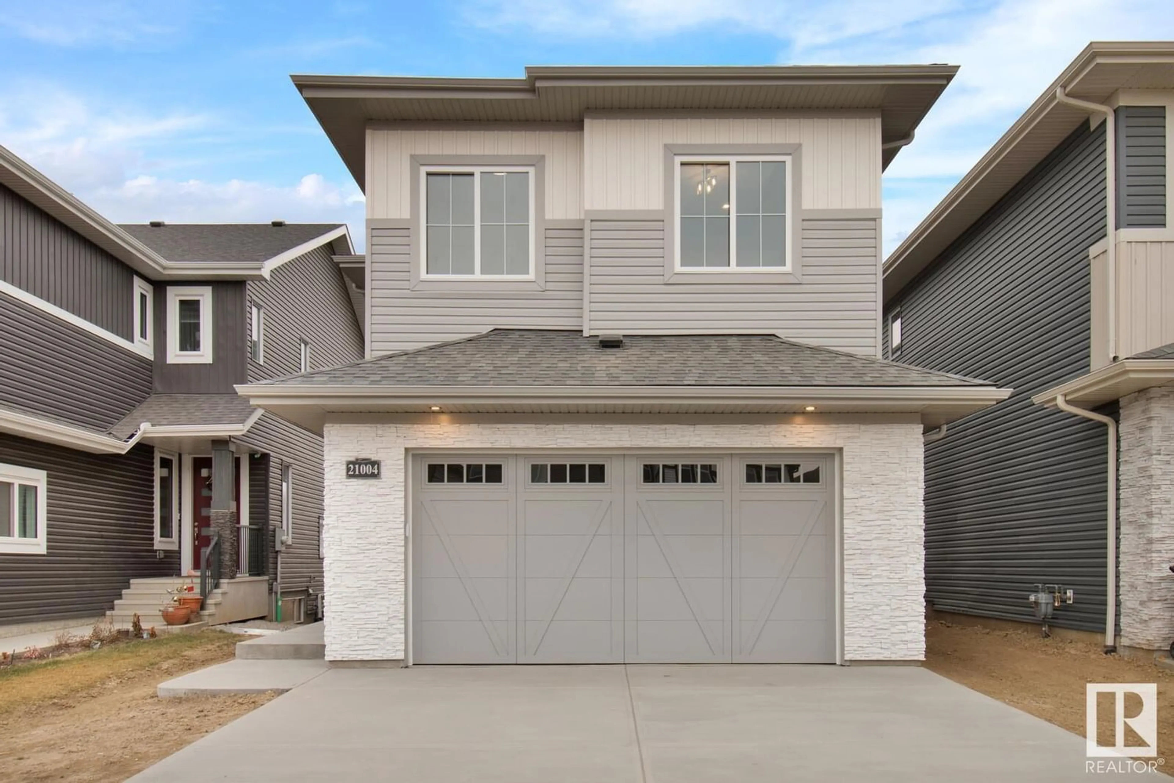 Frontside or backside of a home for 21004 131 AV NW, Edmonton Alberta T5S0P4