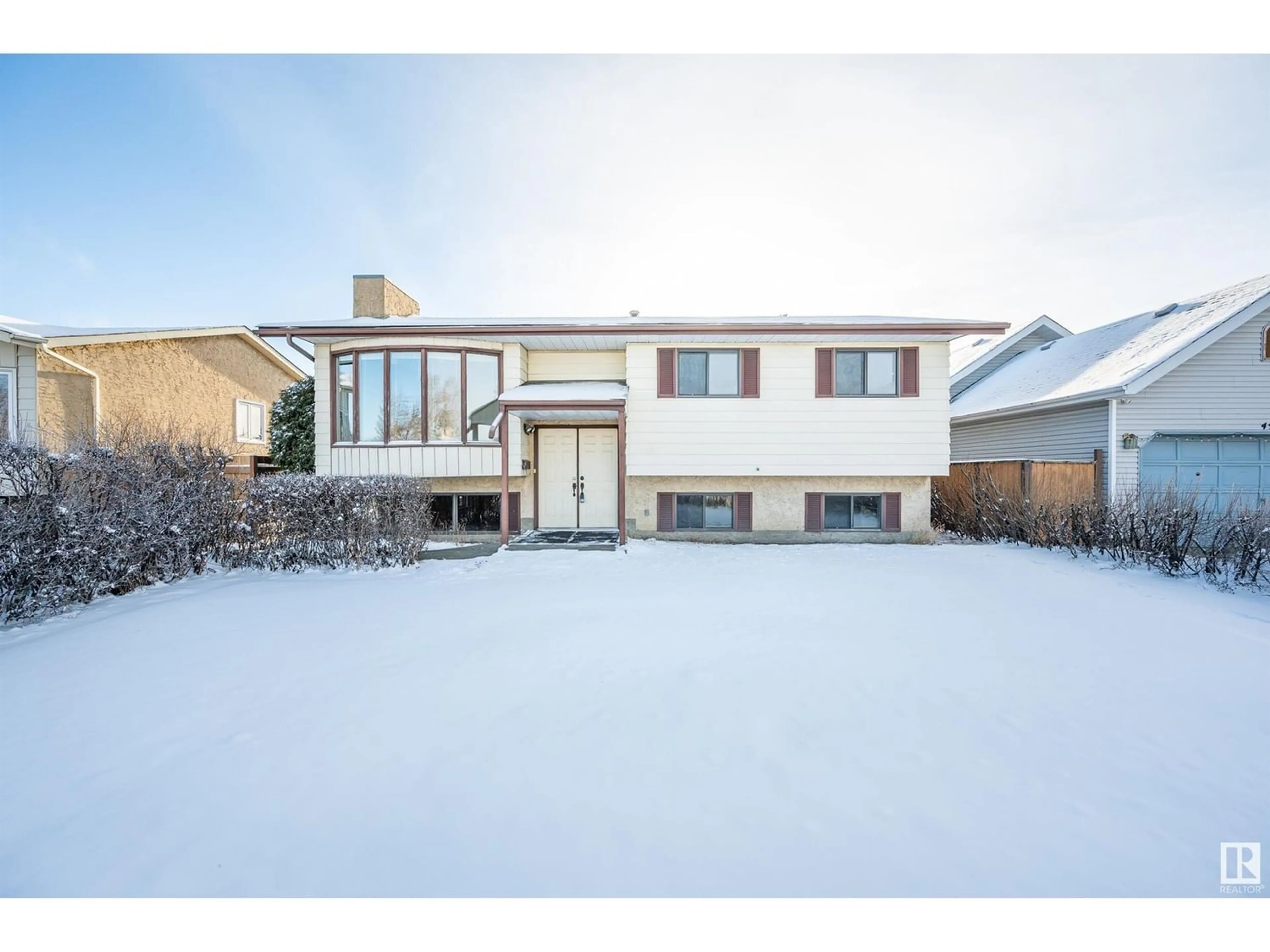 Frontside or backside of a home for 4911 13 AV NW, Edmonton Alberta T6L4E6