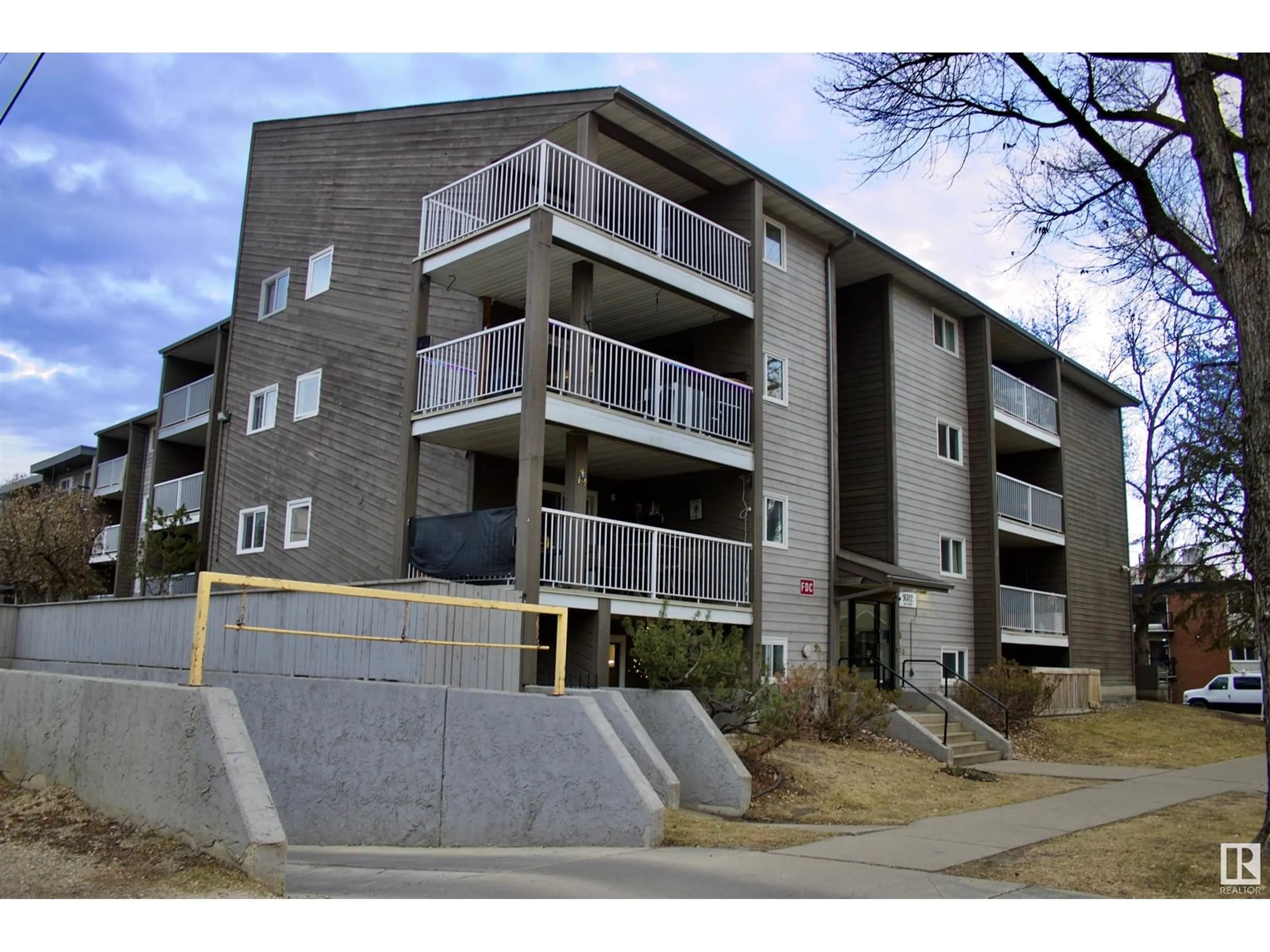 A pic from exterior of the house or condo, the front or back of building for #205 9312 104 AV NW, Edmonton Alberta T5H4G7