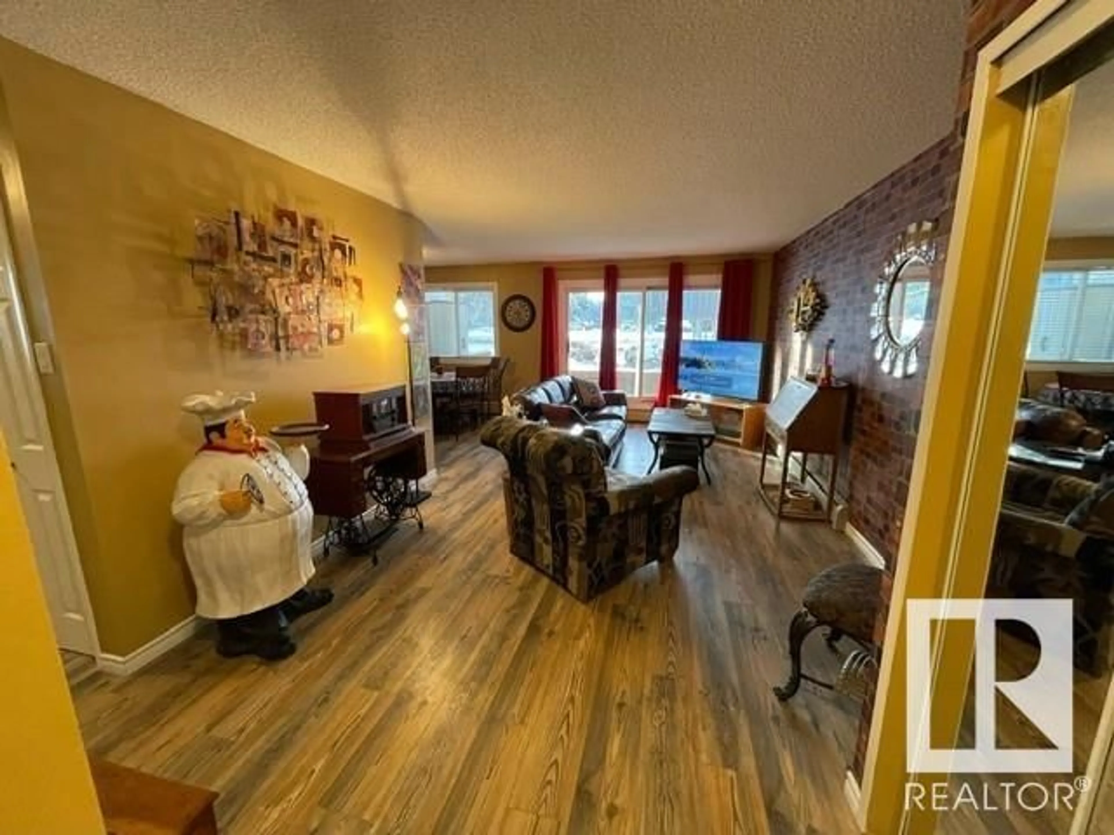 Living room for #106 14825 51 AV NW, Edmonton Alberta T6H5G4