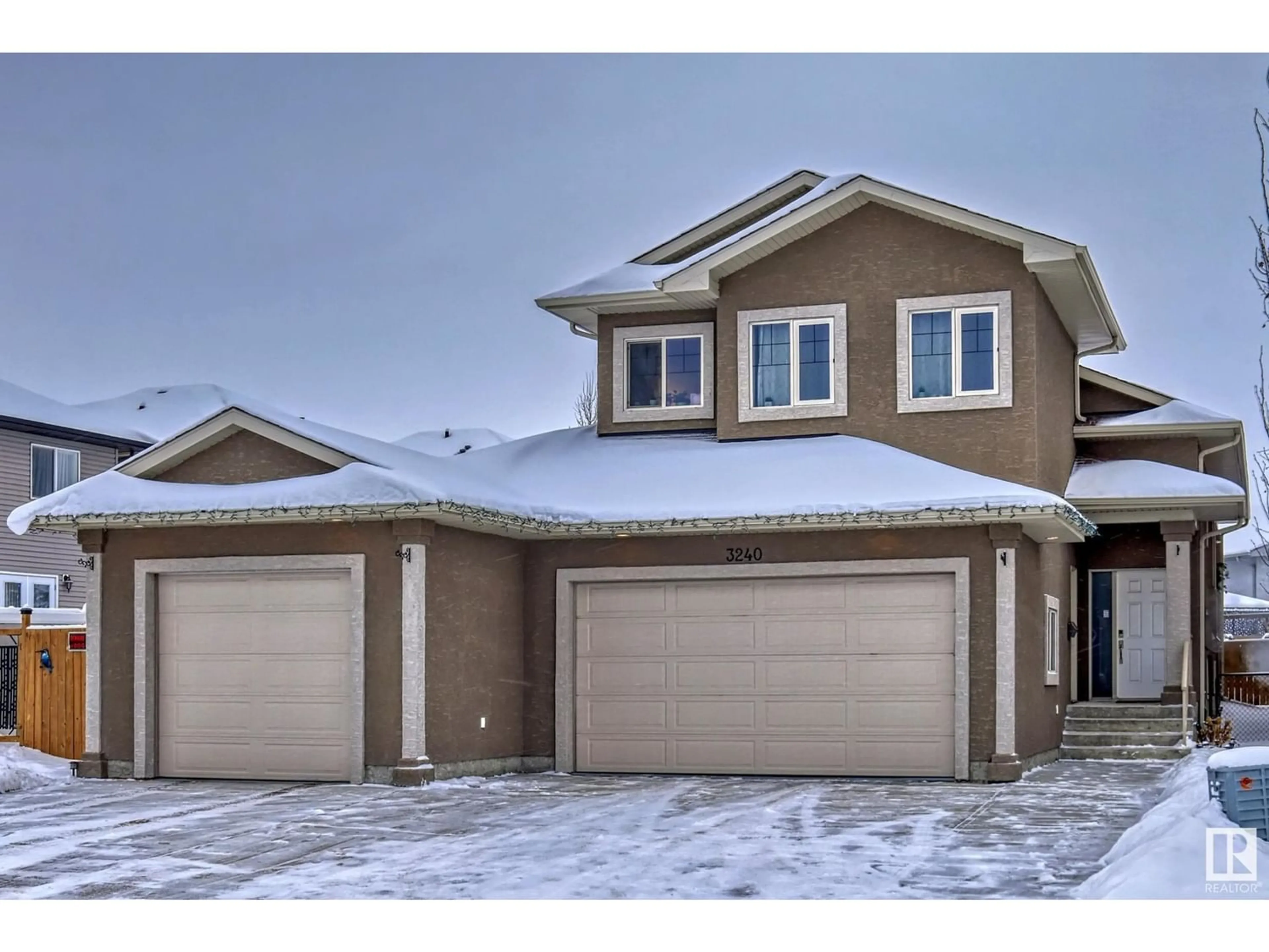 Frontside or backside of a home for 3240 151 AV NW, Edmonton Alberta T5Y0J9