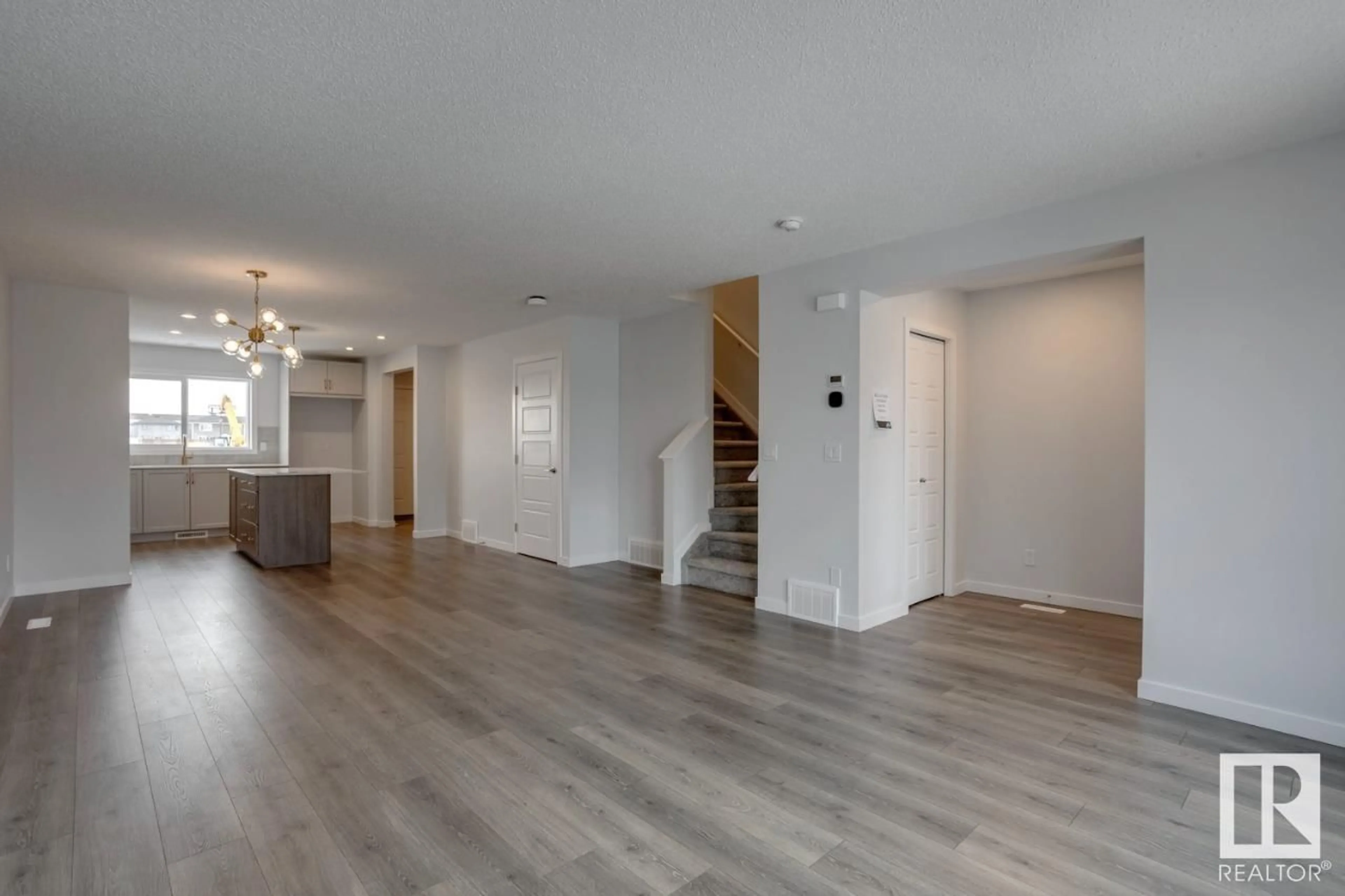 A pic of a room, wood floors for 20415 25 AV NW, Edmonton Alberta T6M1N9