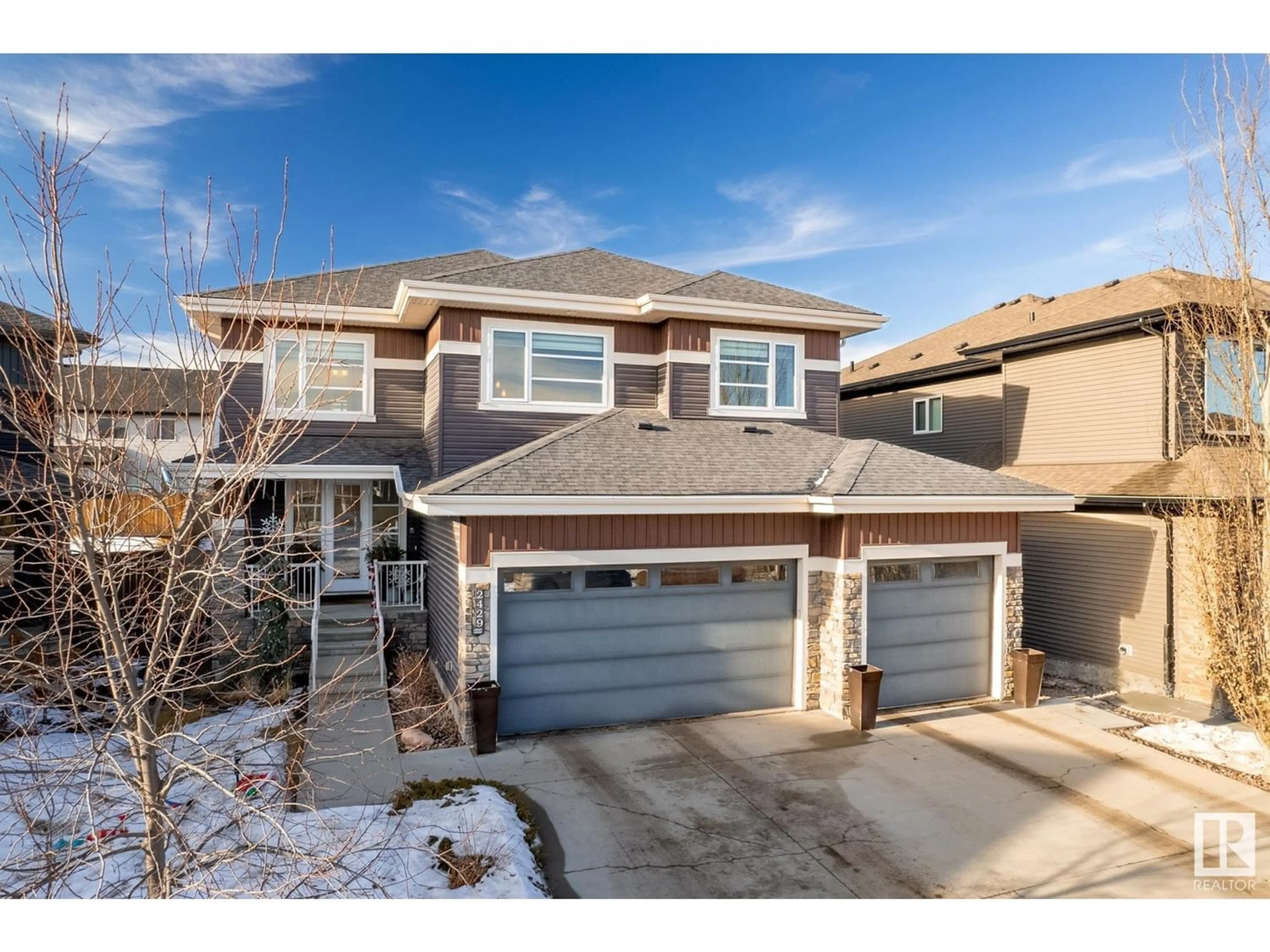 Frontside or backside of a home for 2429 ASHCRAFT CR SW, Edmonton Alberta T6W2M9