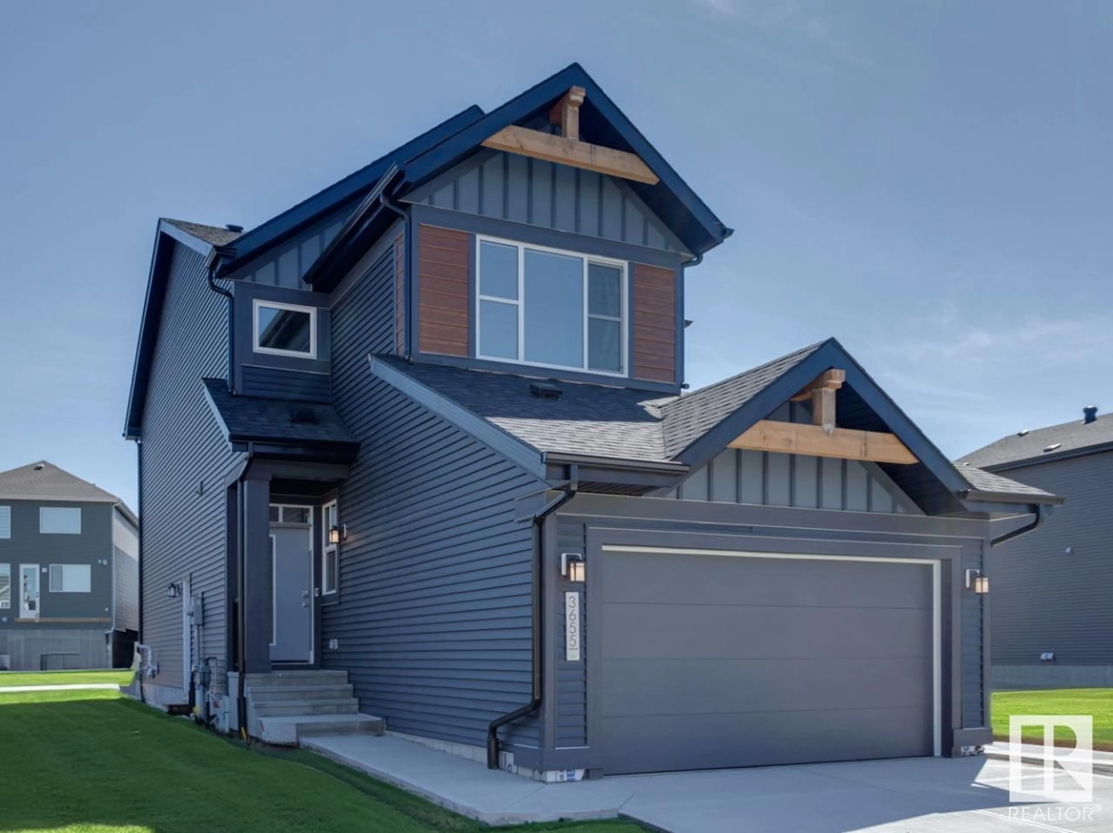 Frontside or backside of a home for 3655 5 AV SW, Edmonton Alberta T6X1A5