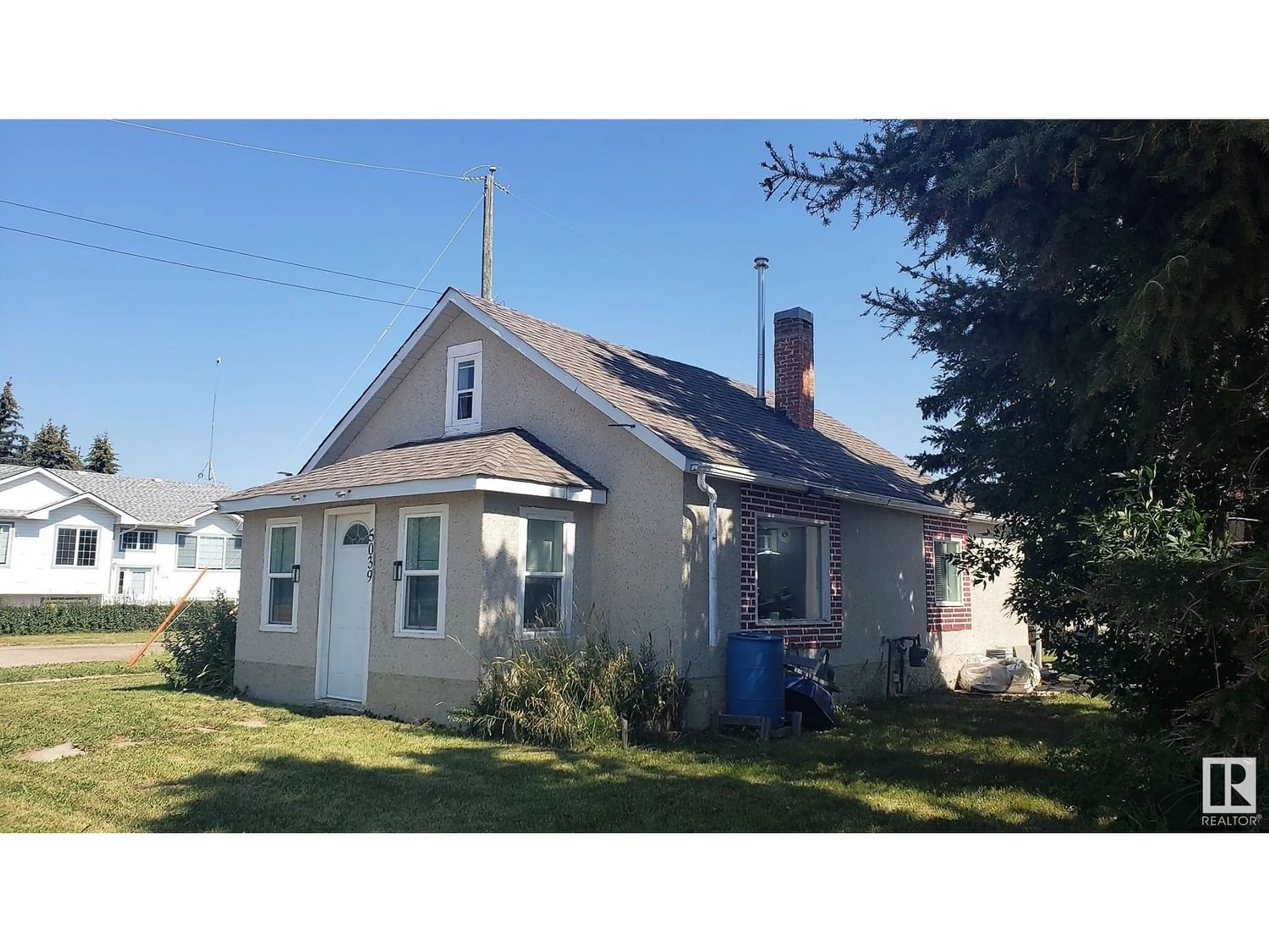 Frontside or backside of a home, cottage for 5039 50 ST, Warburg Alberta T0C2T0