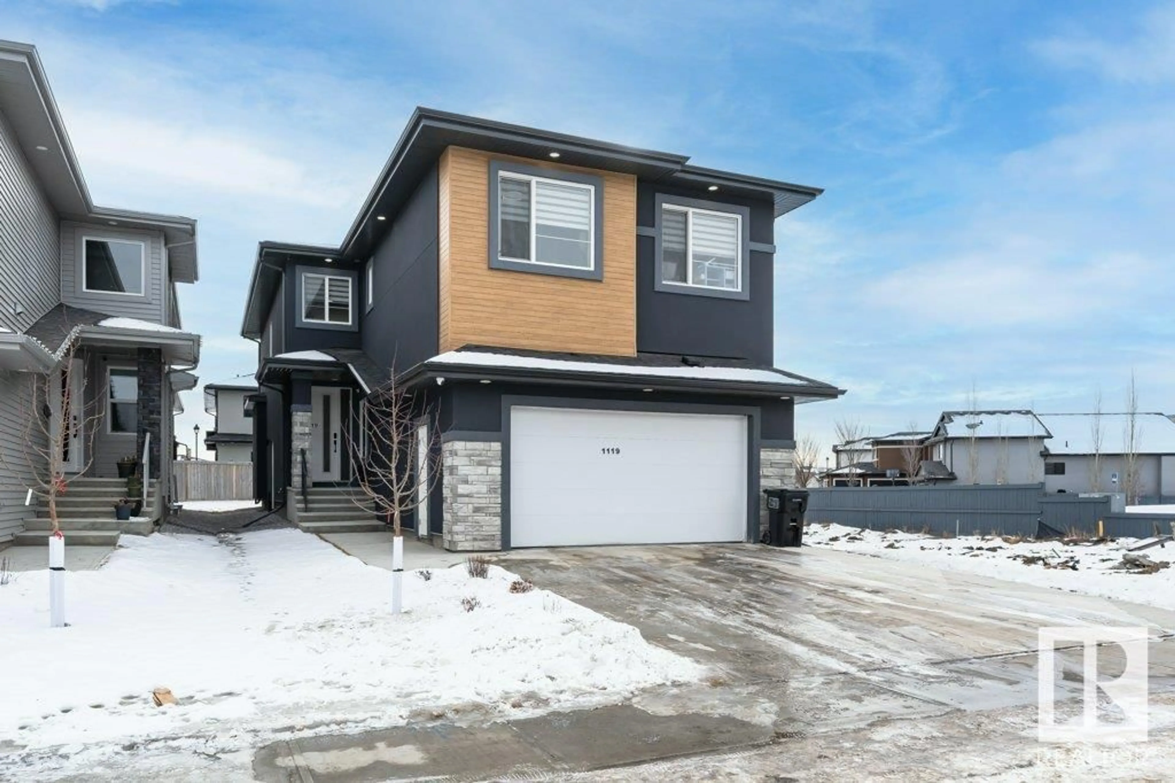 Frontside or backside of a home for 1119 150 AV NW, Edmonton Alberta T5Y4C1