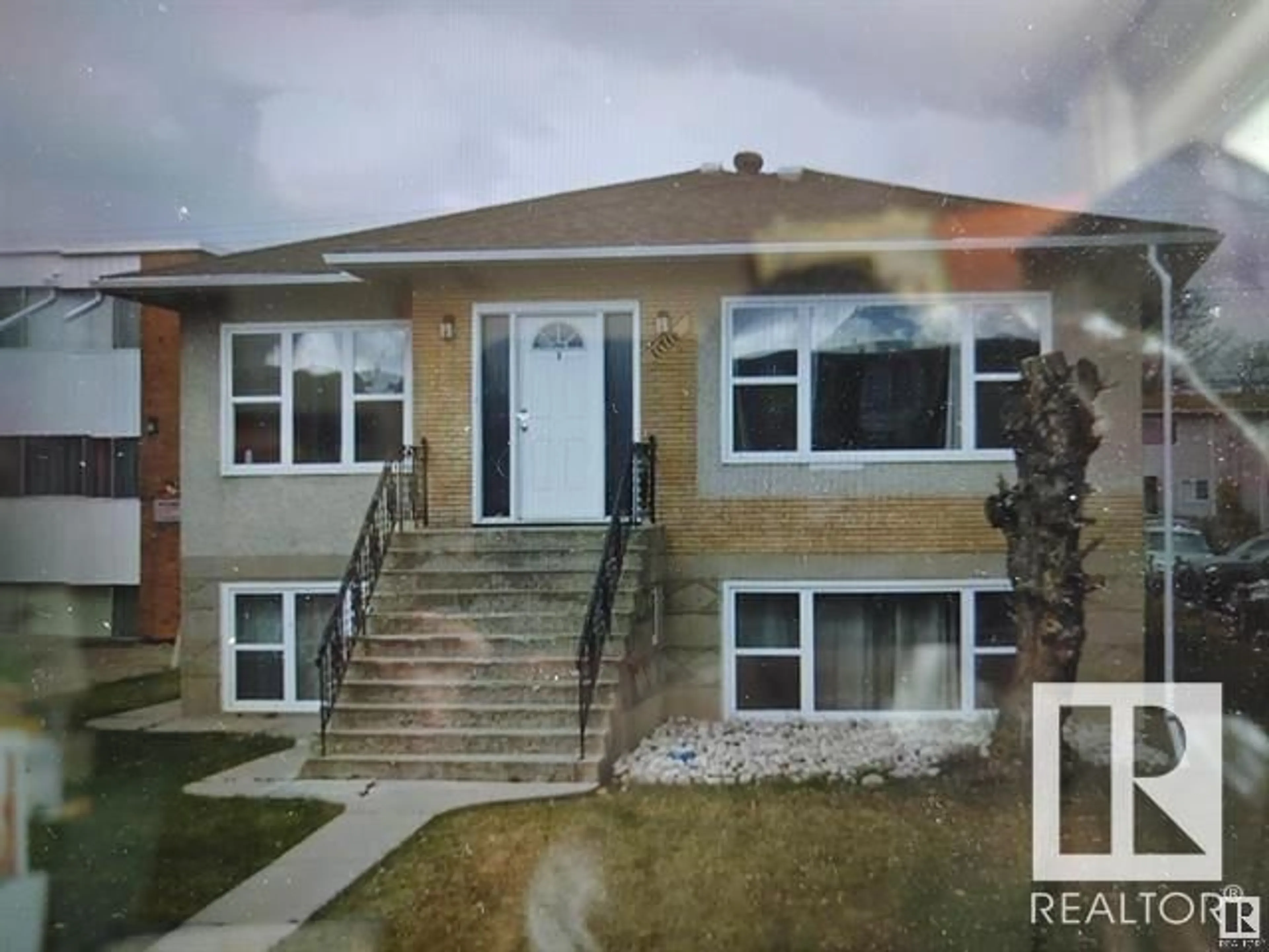 Frontside or backside of a home for 11716 124 ST NW, Edmonton Alberta T5M0K9
