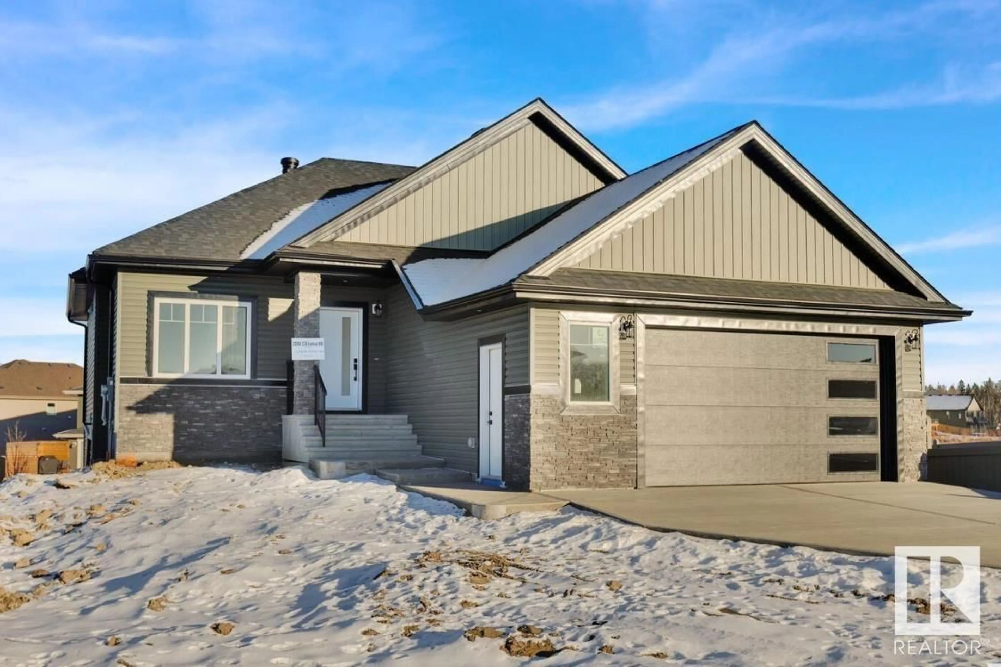 Frontside or backside of a home for 712 166 AV NE NE, Edmonton Alberta T5Y0P6