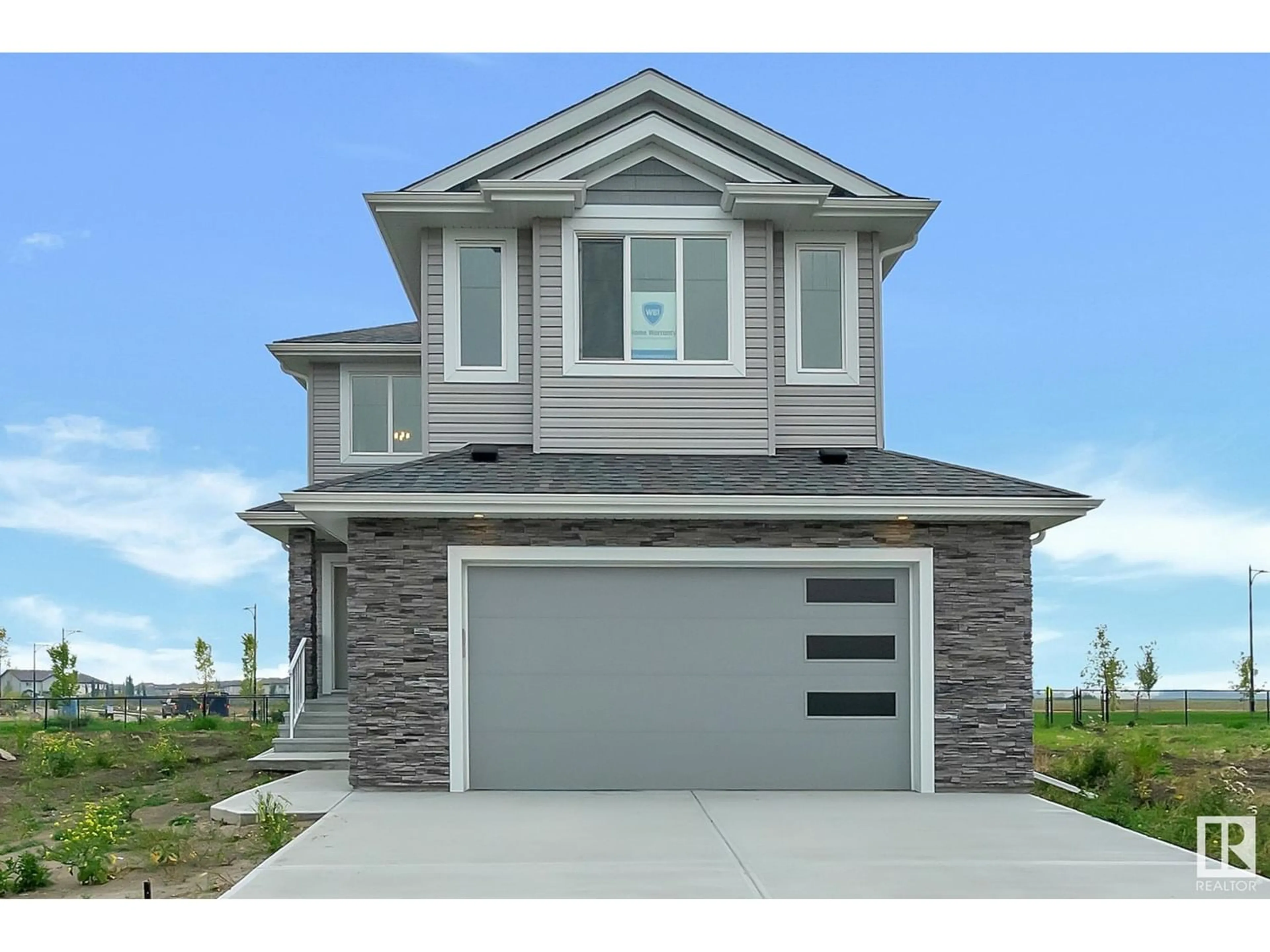 Frontside or backside of a home for 122 ELLICE BN, Fort Saskatchewan Alberta T8L0E9