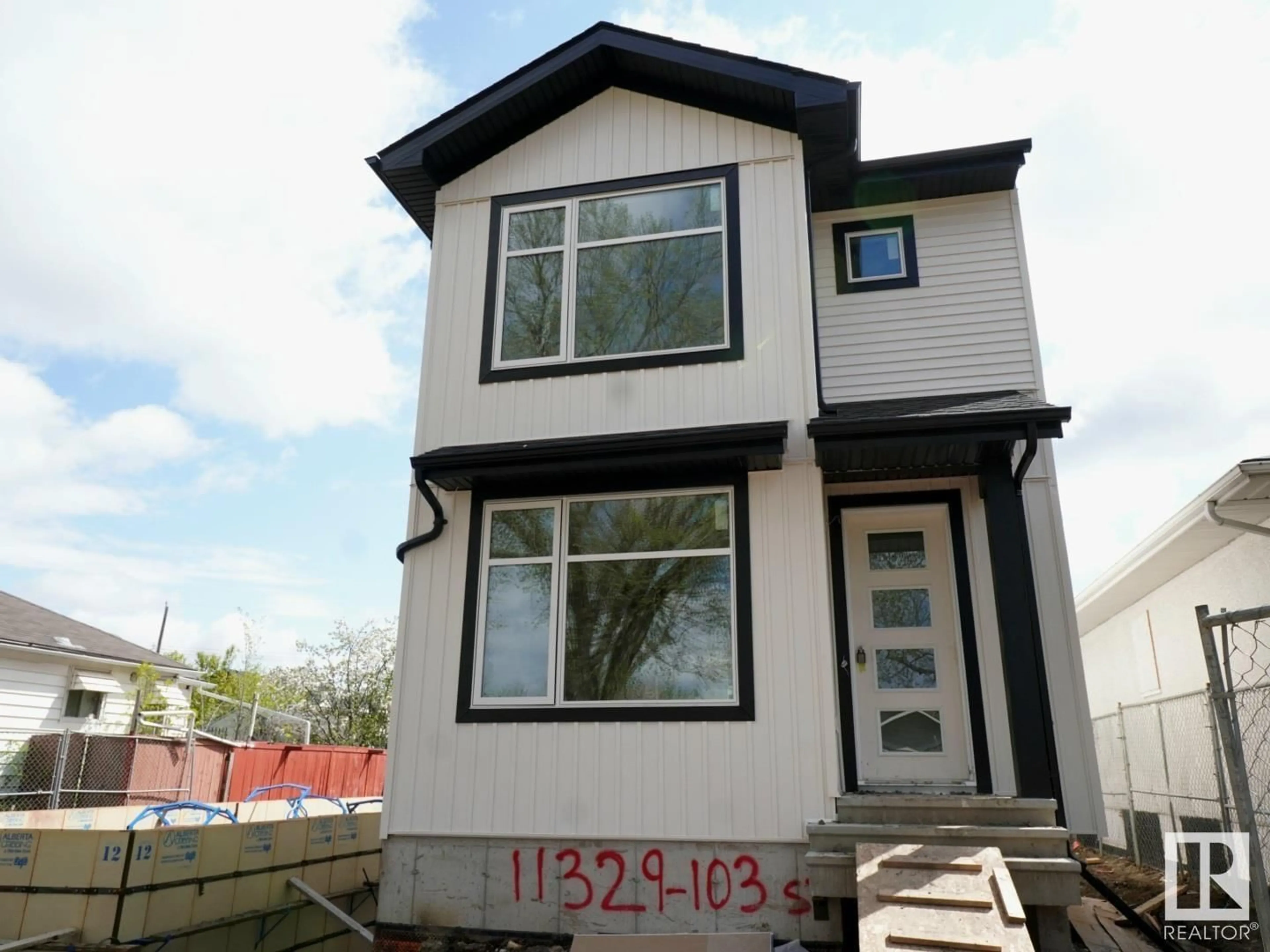 Frontside or backside of a home for 11329 103 ST NW, Edmonton Alberta T5G2H8