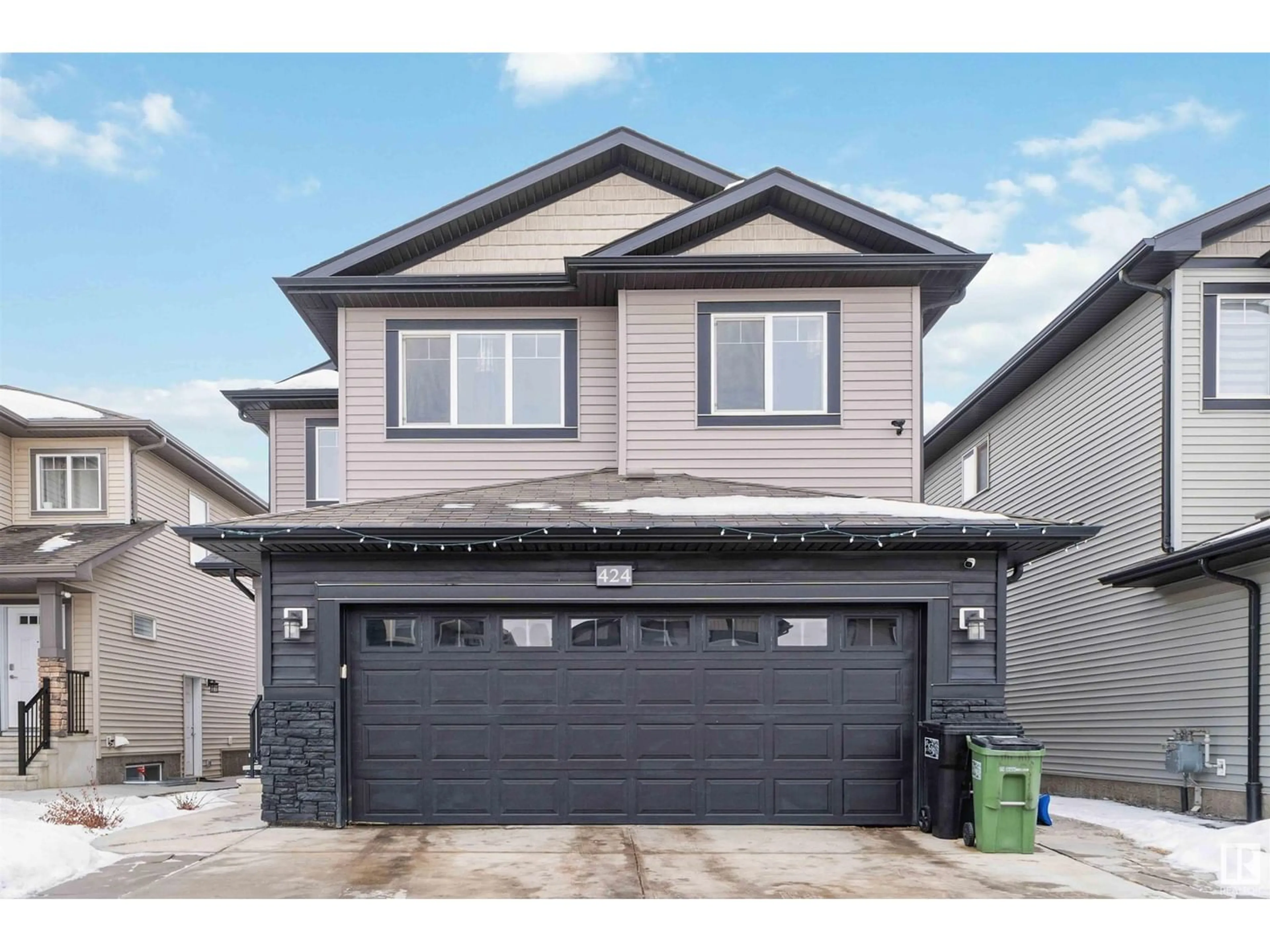 Frontside or backside of a home for 424 42 AV NW, Edmonton Alberta T6T2G1