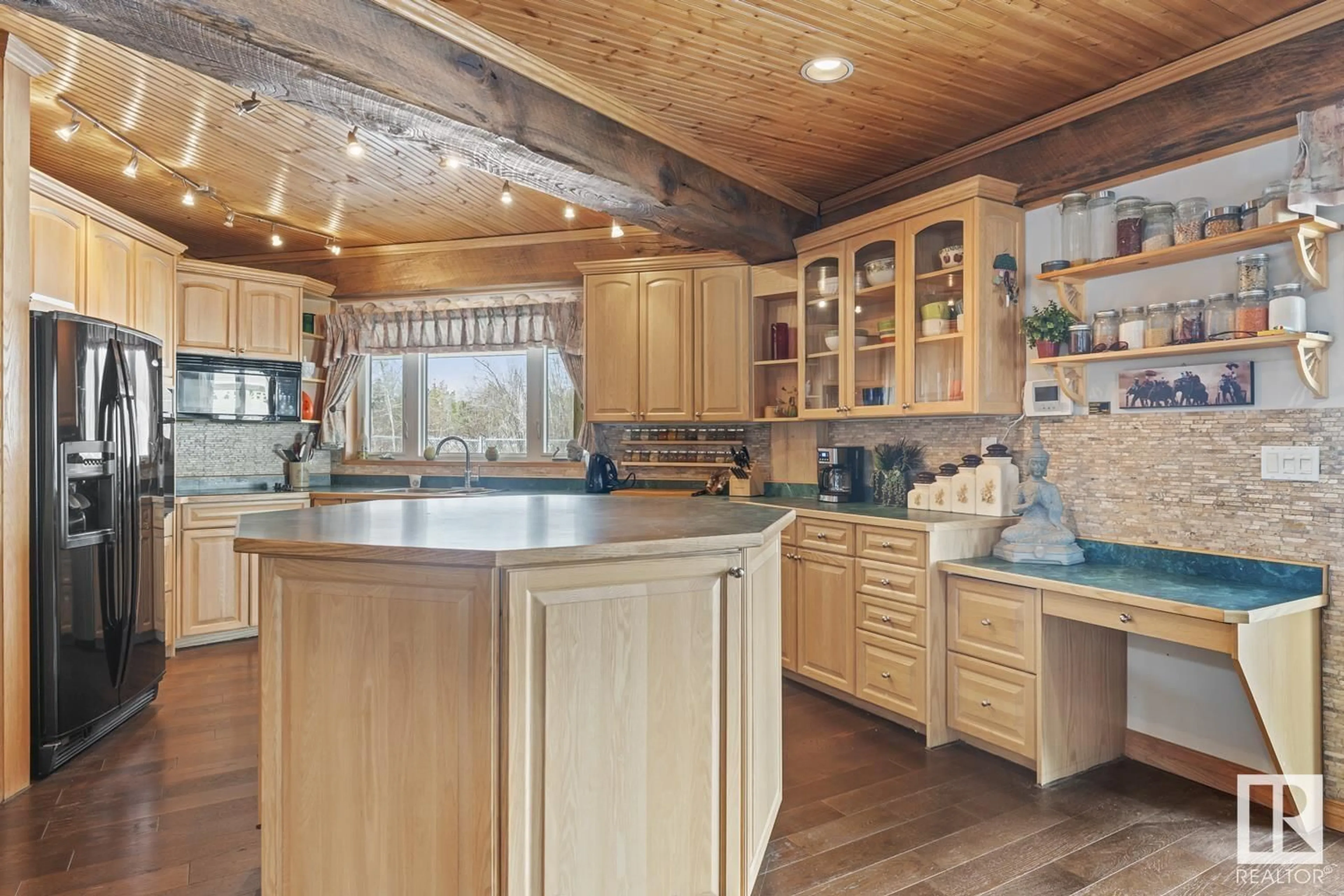 Rustic kitchen, wood/laminate floor for #101 61209 Range Road 465, Rural Bonnyville M.D. Alberta T9N2J6