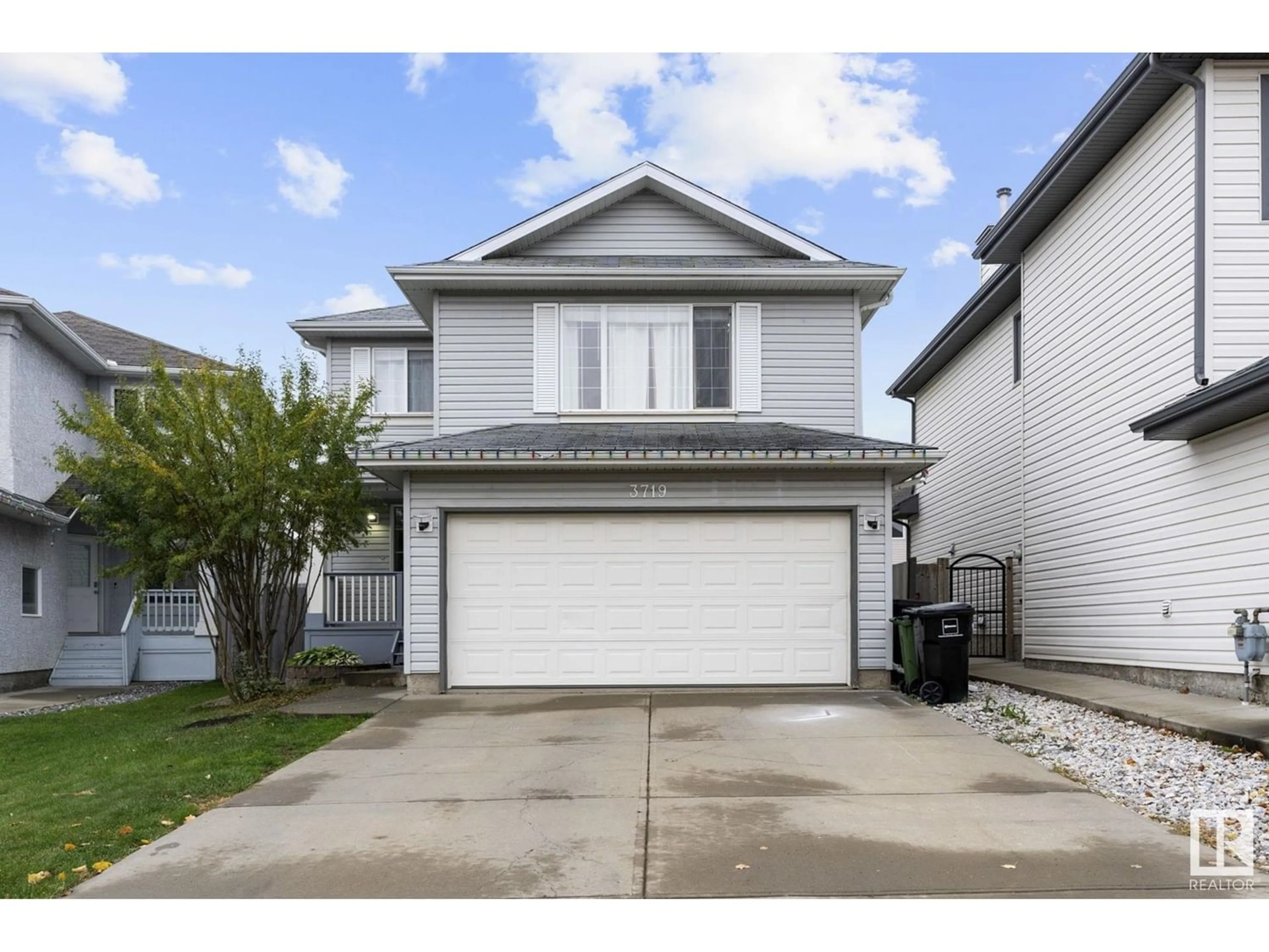 Frontside or backside of a home for 3719 162 AV NW, Edmonton Alberta T5Y3G3