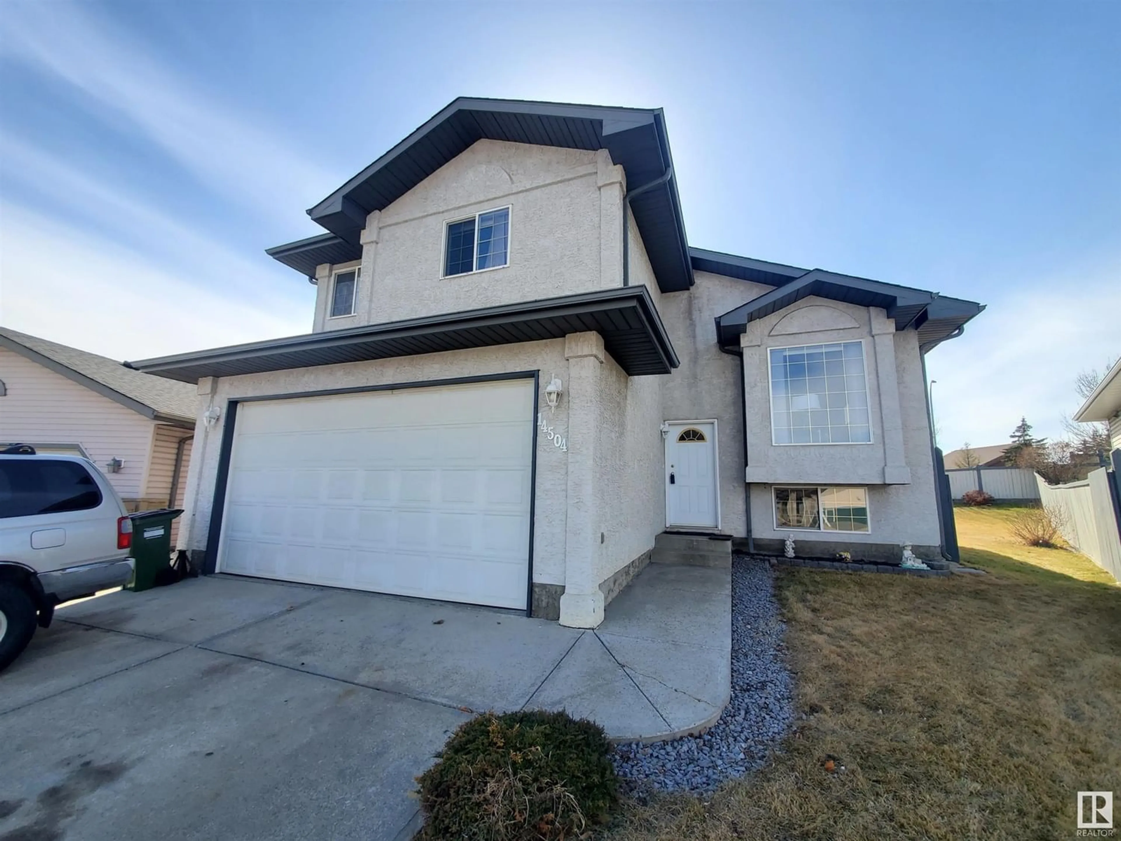 Frontside or backside of a home for 14504 49 ST NW, Edmonton Alberta T5Y2X8