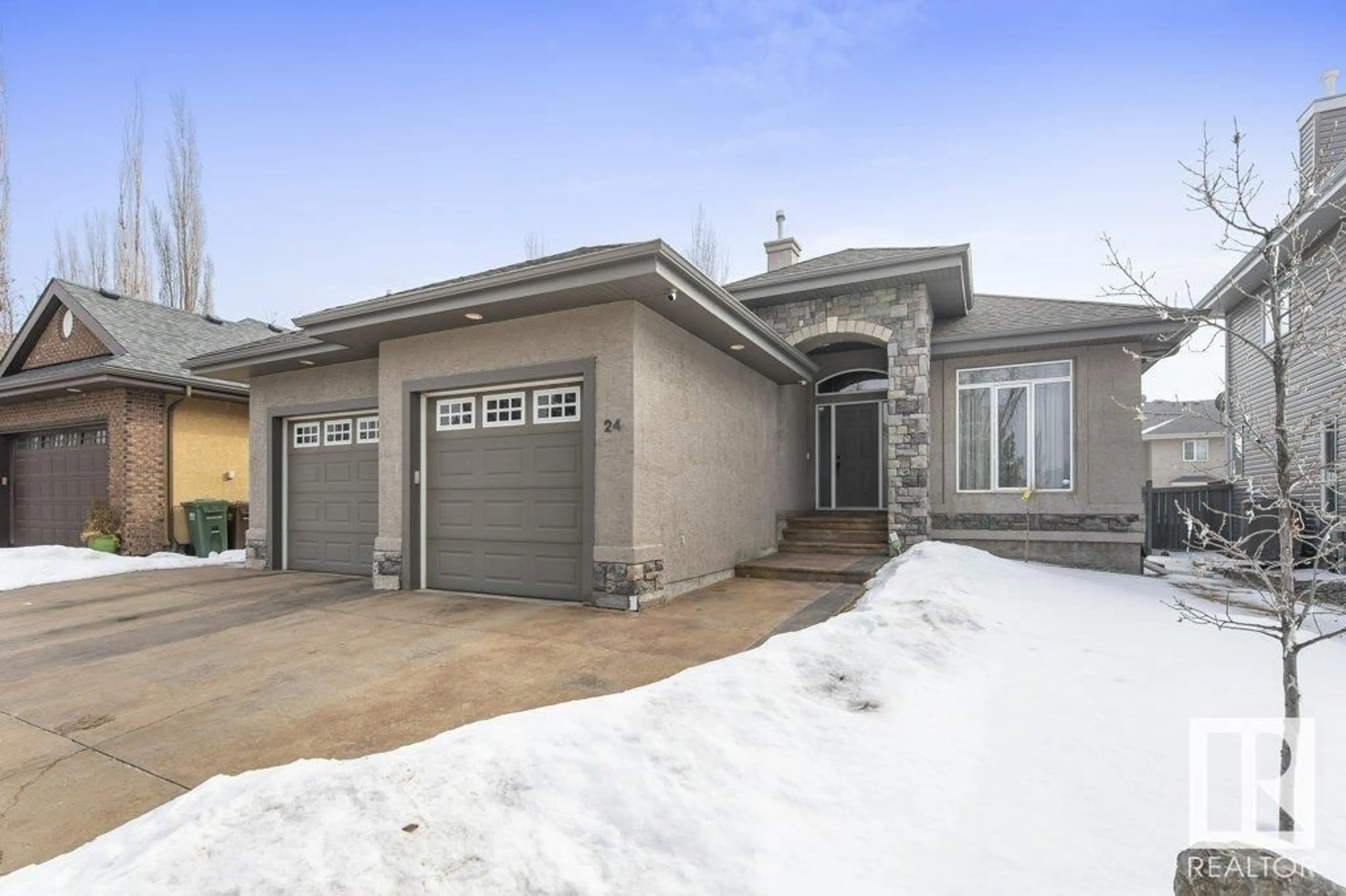 Frontside or backside of a home for 24 LACOMBE DR, St. Albert Alberta T8N7H4