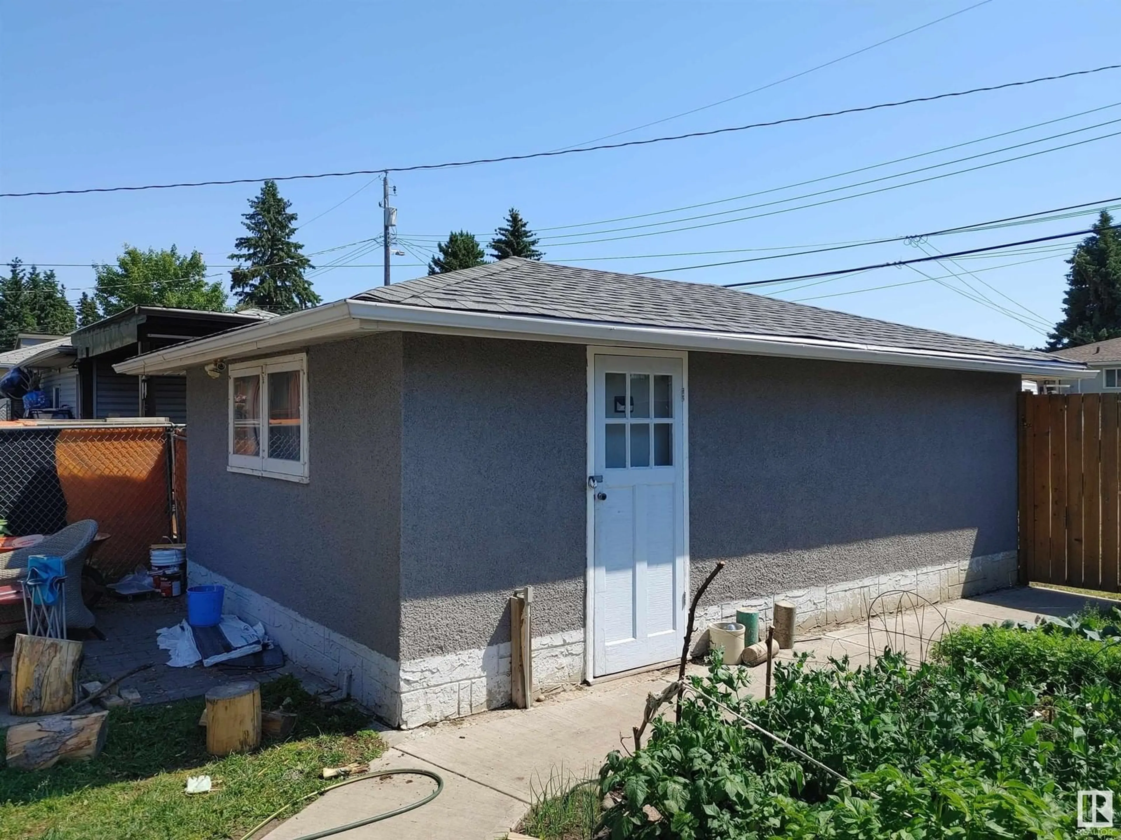 Frontside or backside of a home for 10525 63 AV NW, Edmonton Alberta T6H1P5