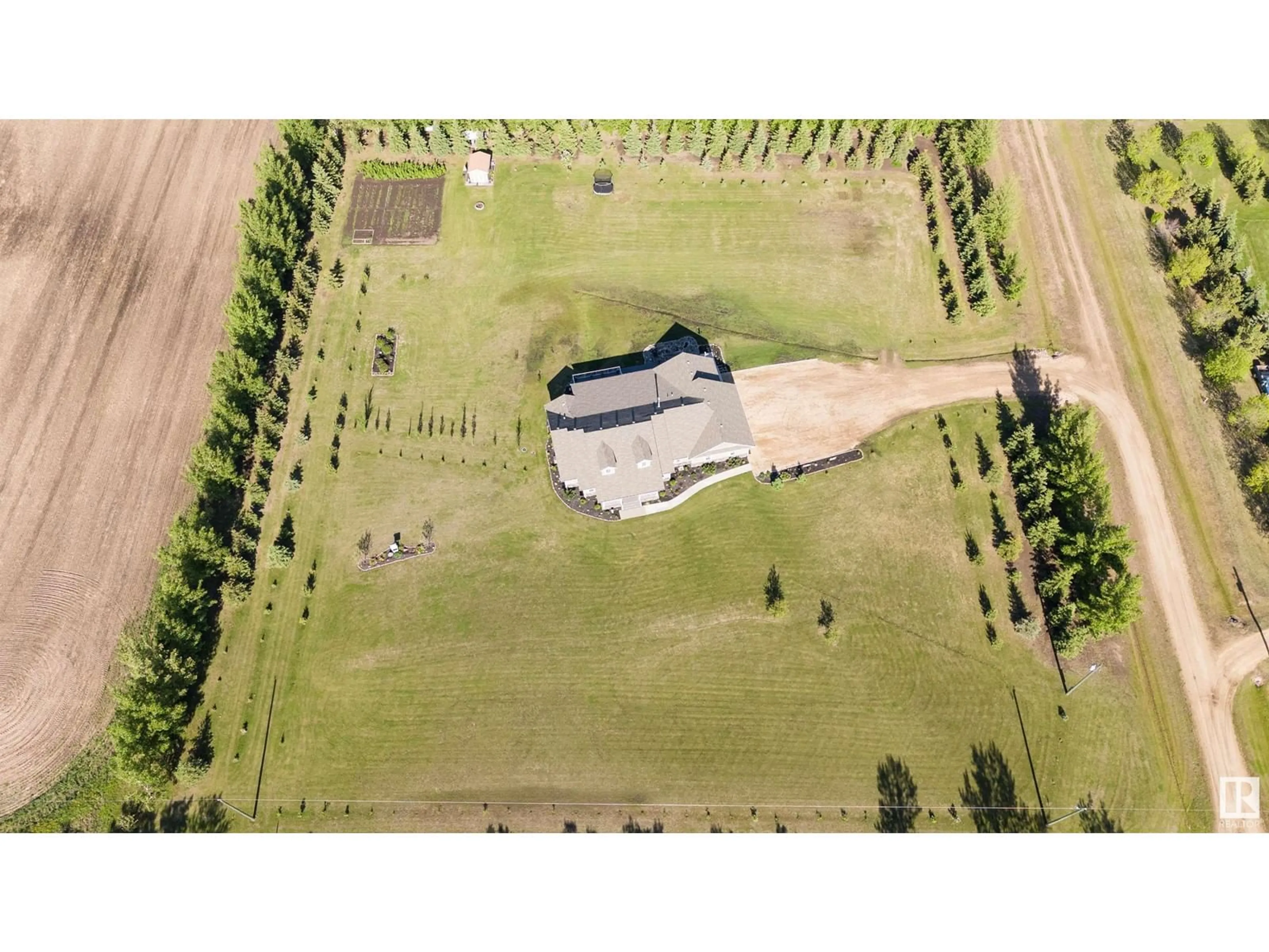 A pic from outside/outdoor area/front of a property/back of a property/a pic from drone, building for #2 - 59327 RGE RD 263, Rural Westlock County Alberta T7P2N9