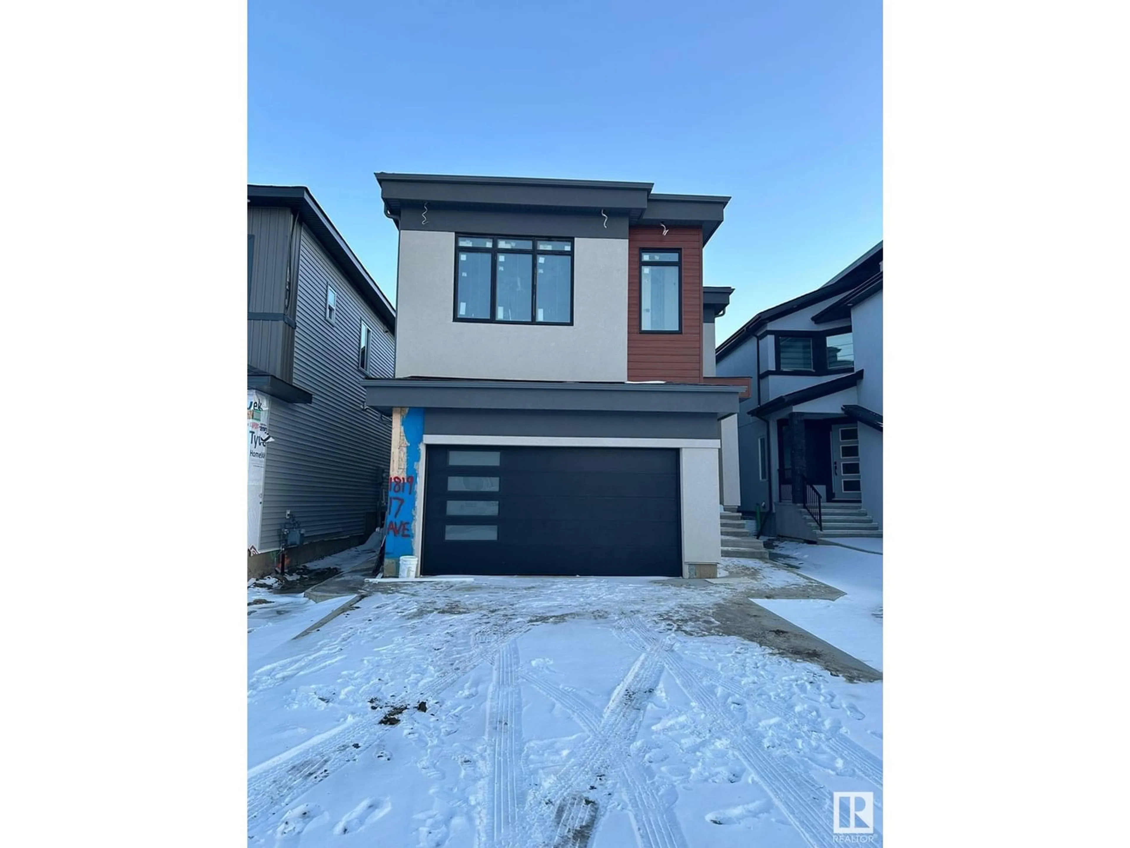 Frontside or backside of a home for 1819 17 AV NW, Edmonton Alberta T6T1J1