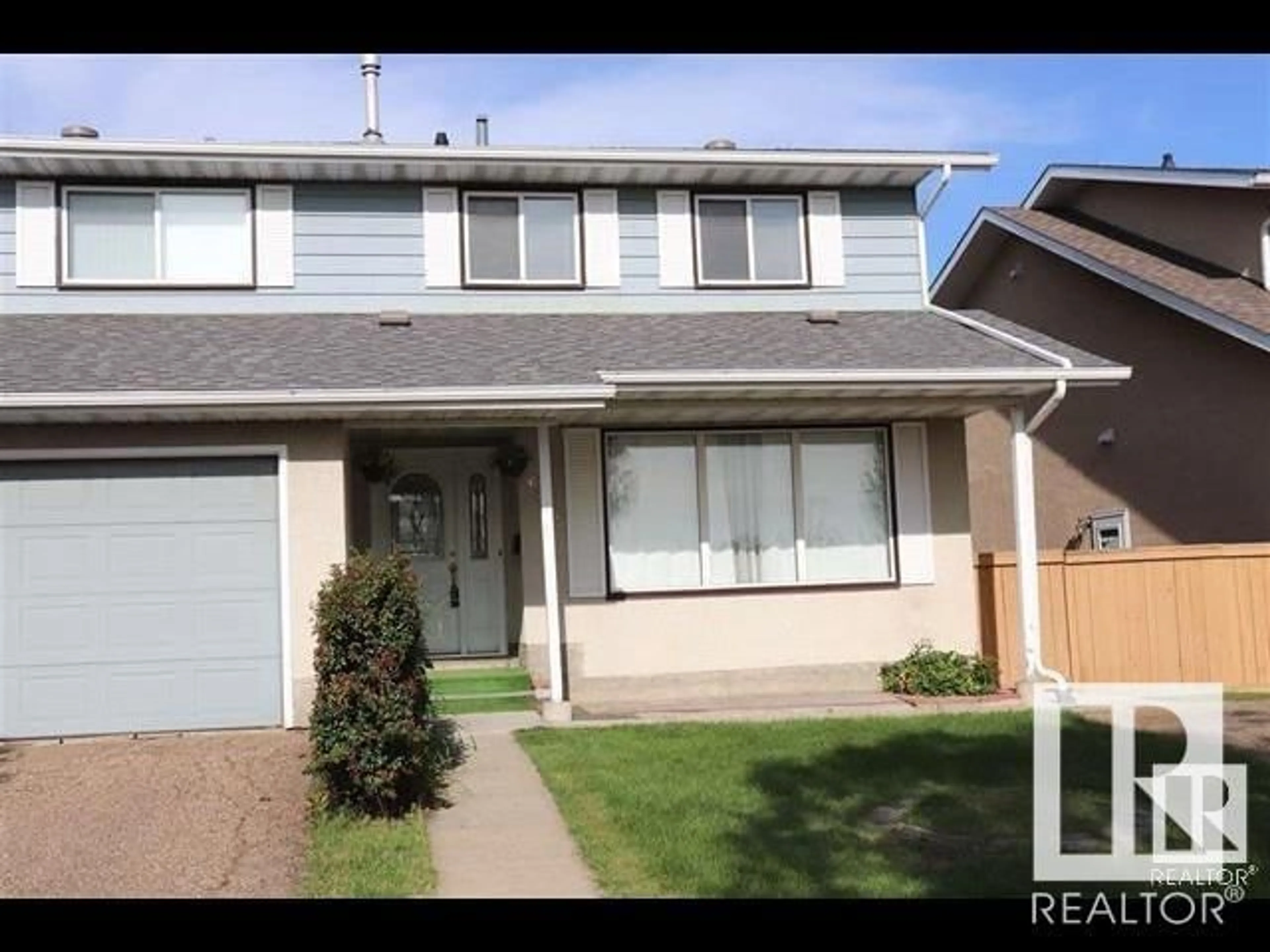 Frontside or backside of a home for 16214 109 ST NW, Edmonton Alberta T5X2P9