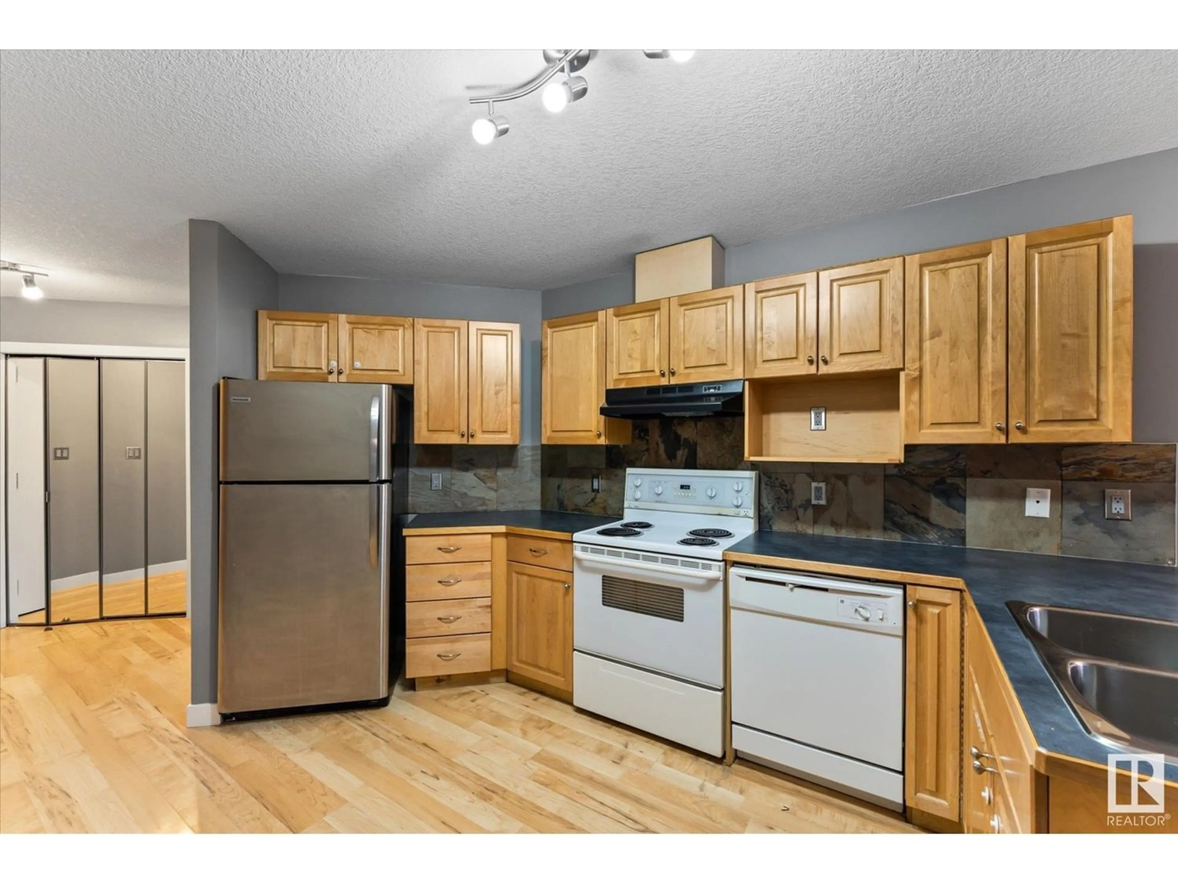 Standard kitchen, wood floors, cottage for #202 9336 JASPER AV NW, Edmonton Alberta T5H3T5