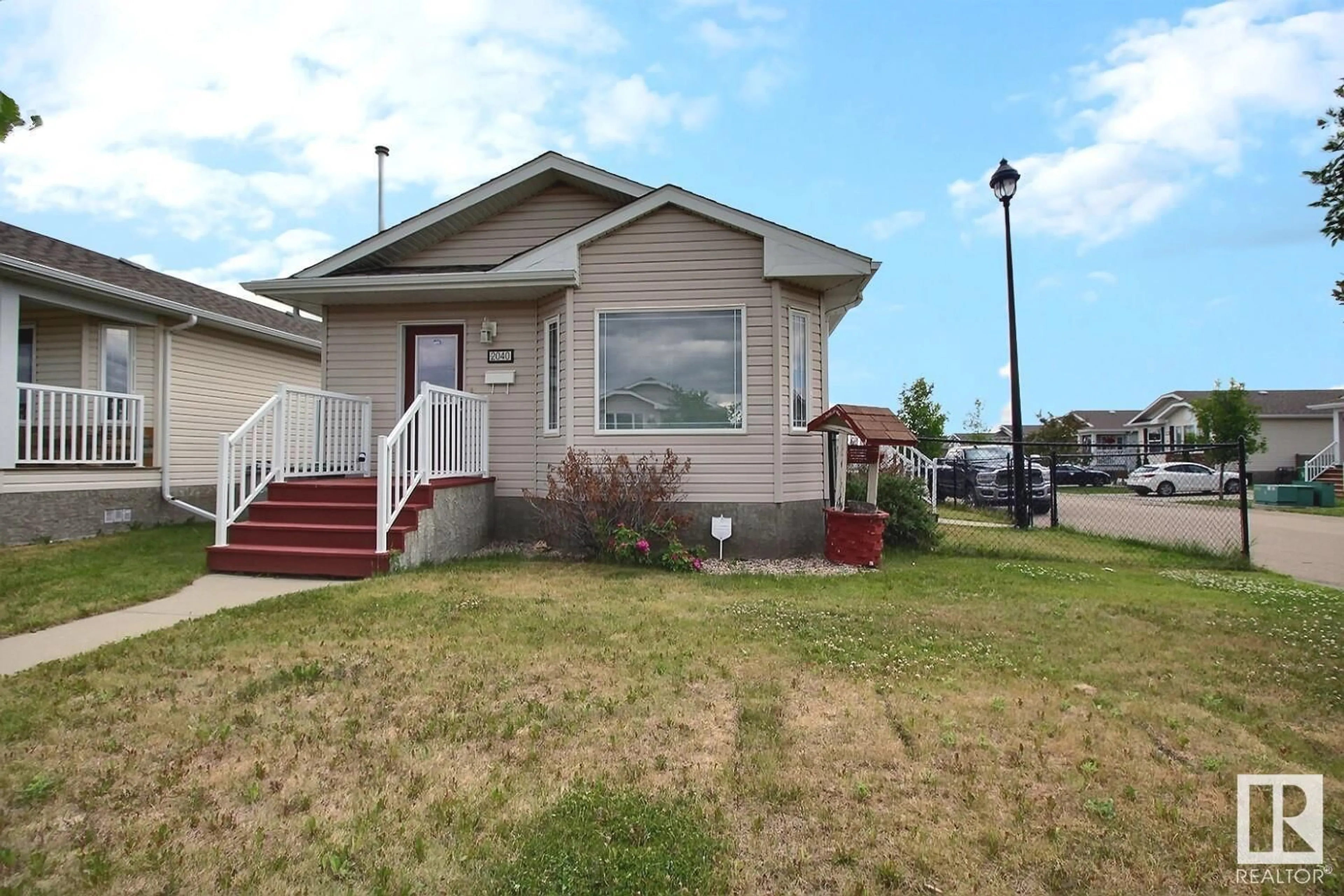 Frontside or backside of a home for 2040 ASPEN CR, Leduc Alberta T9E8P9