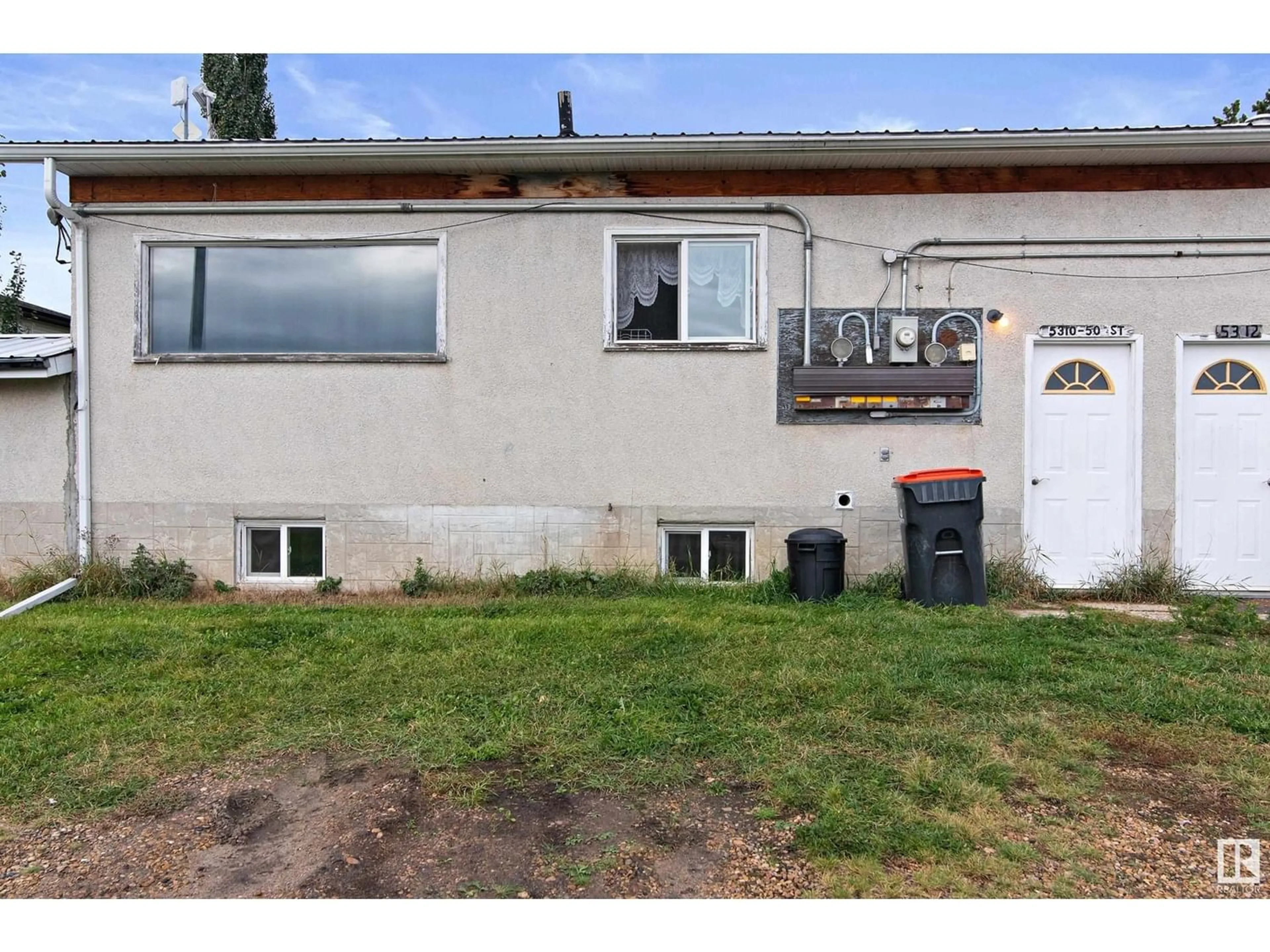 Frontside or backside of a home, the front or back of building for 5310 & 5312 50 ST, Thorsby Alberta T0C2P0