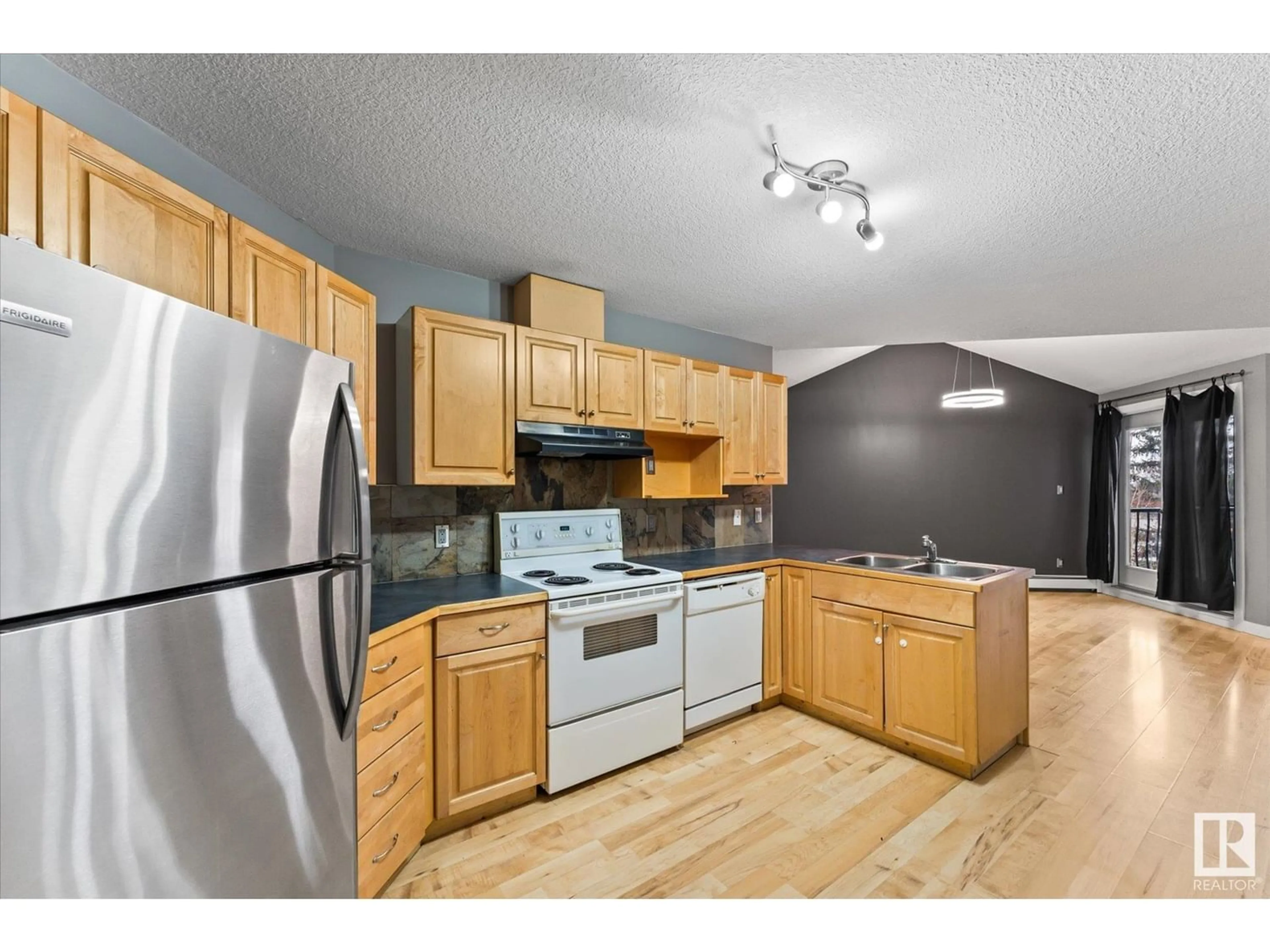 Standard kitchen for #204 9336 JASPER AV NW, Edmonton Alberta T5H3T5