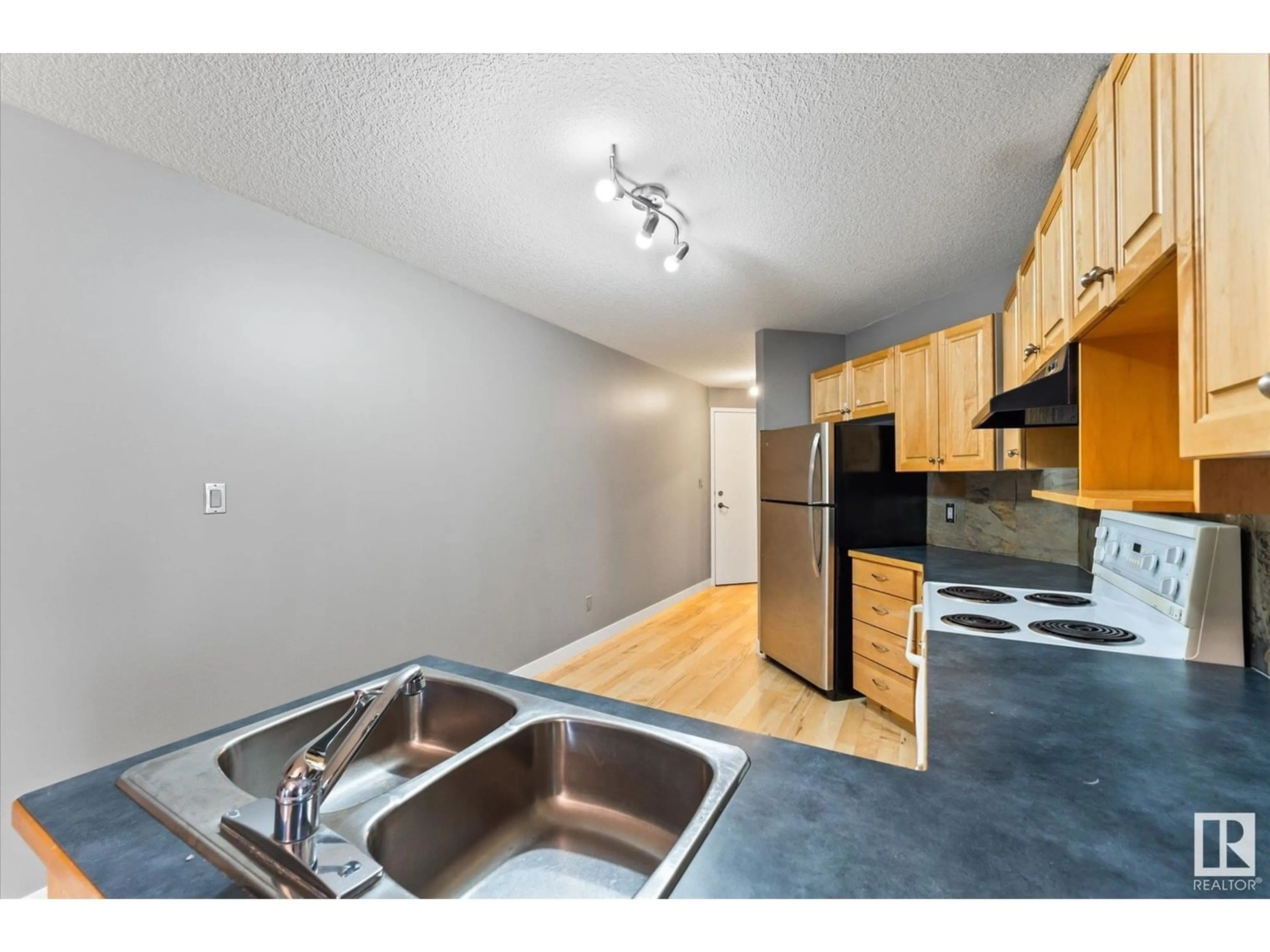 Standard kitchen for #204 9336 JASPER AV NW, Edmonton Alberta T5H3T5