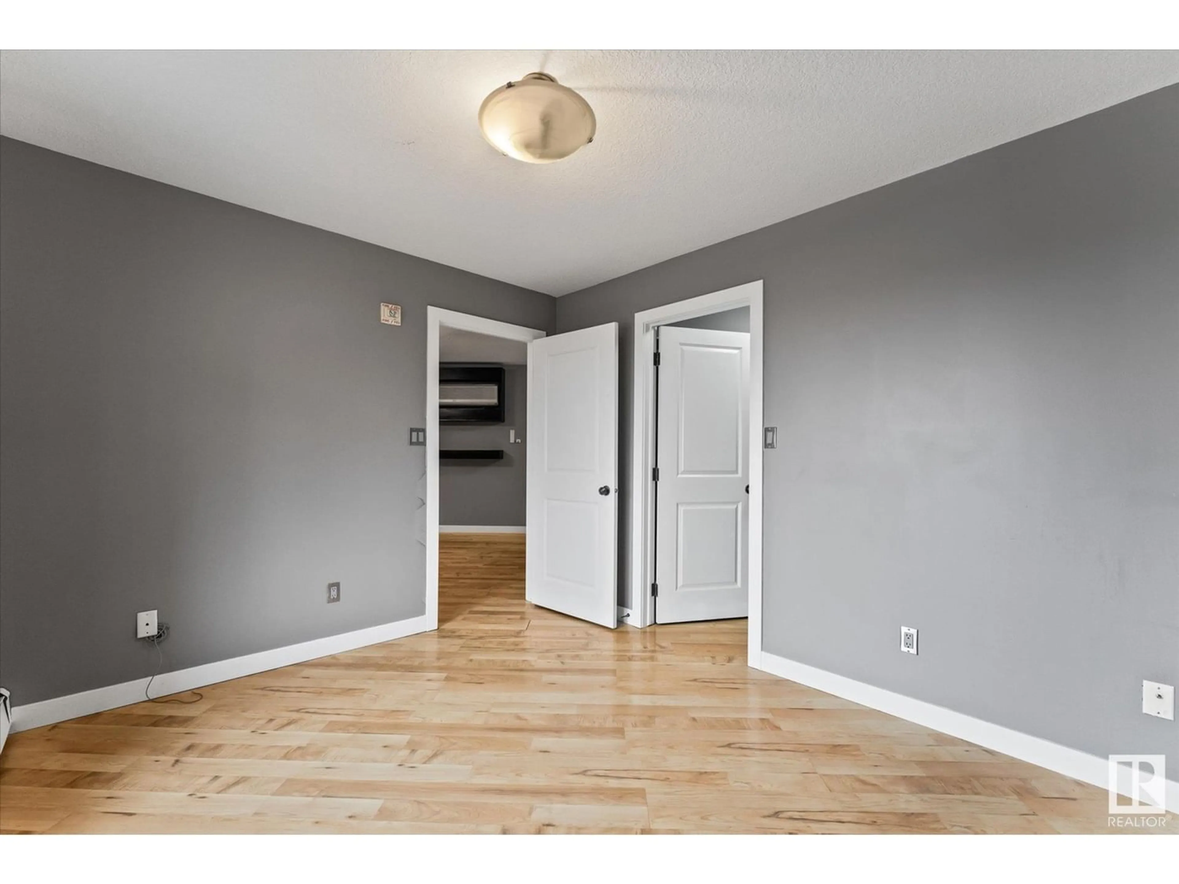 A pic of a room, wood floors for #205 9336 JASPER AV NW, Edmonton Alberta T5H3T5