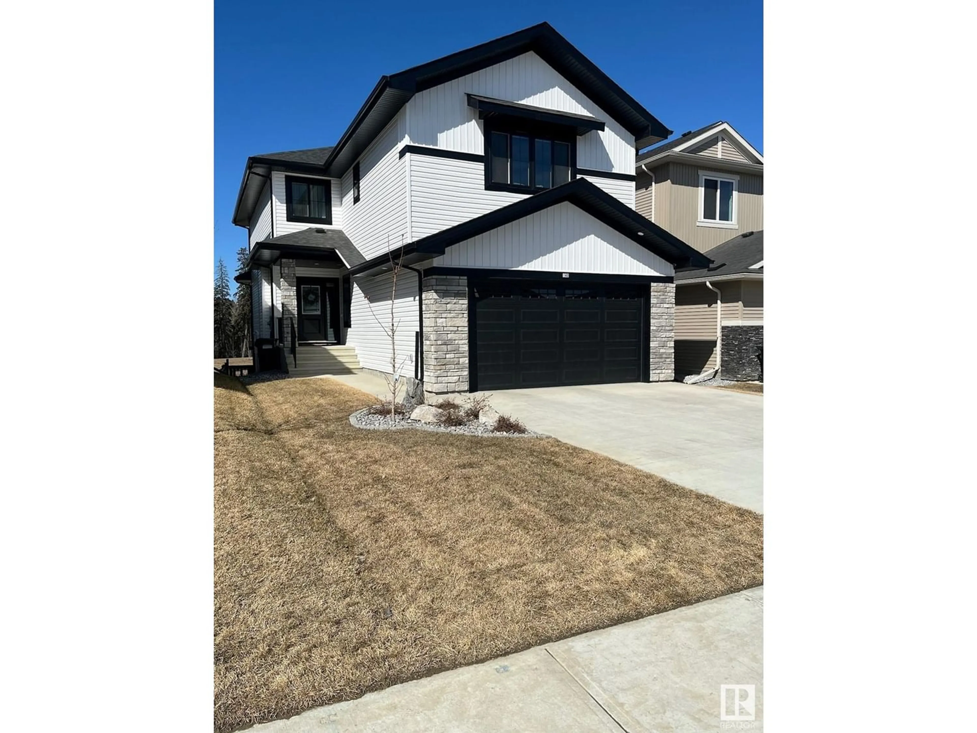 Frontside or backside of a home for 140 HEMINGWAY CR, Spruce Grove Alberta T7X2W9