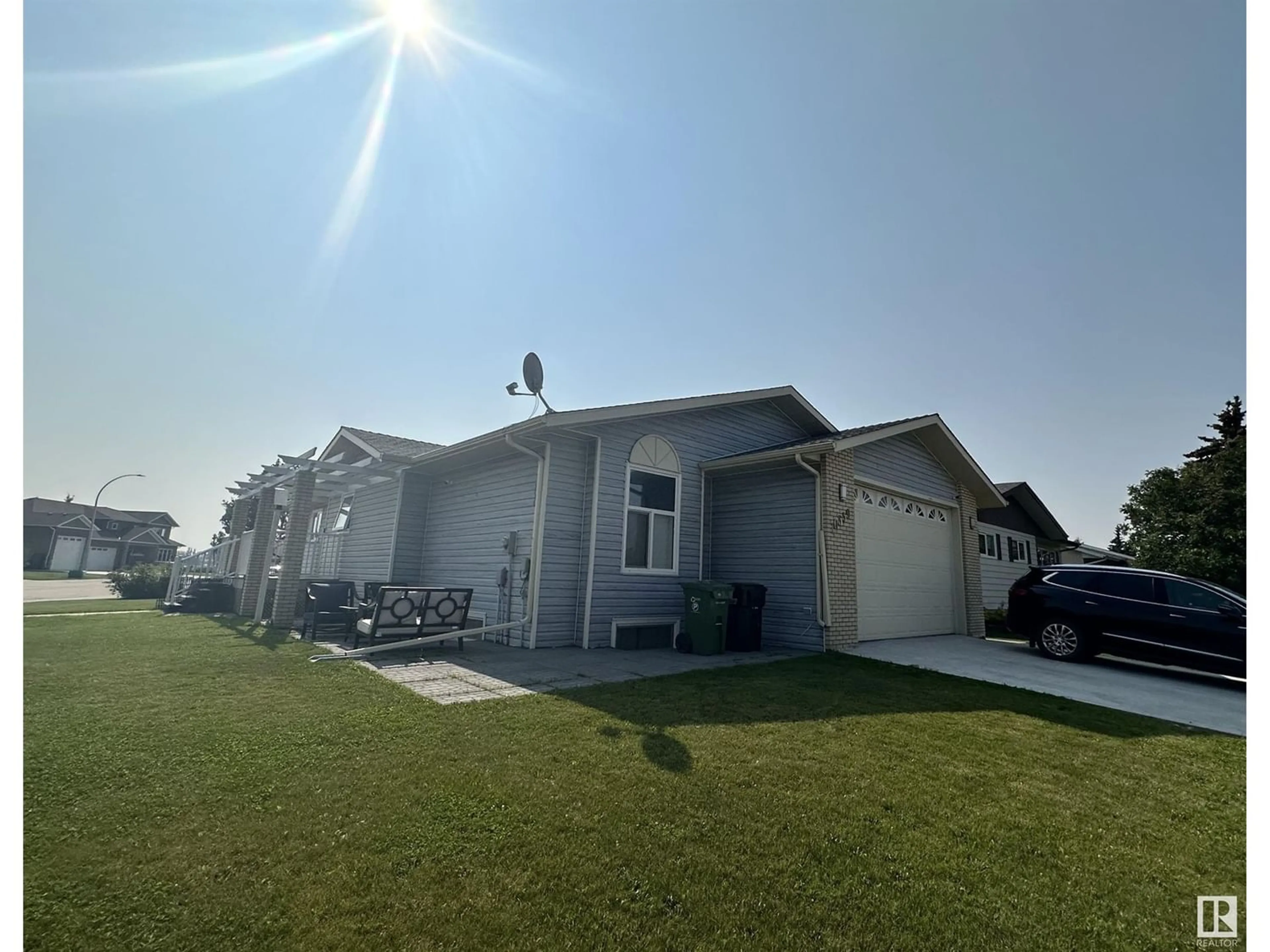 Frontside or backside of a home for 10559 110 ST, Westlock Alberta T7P1A3