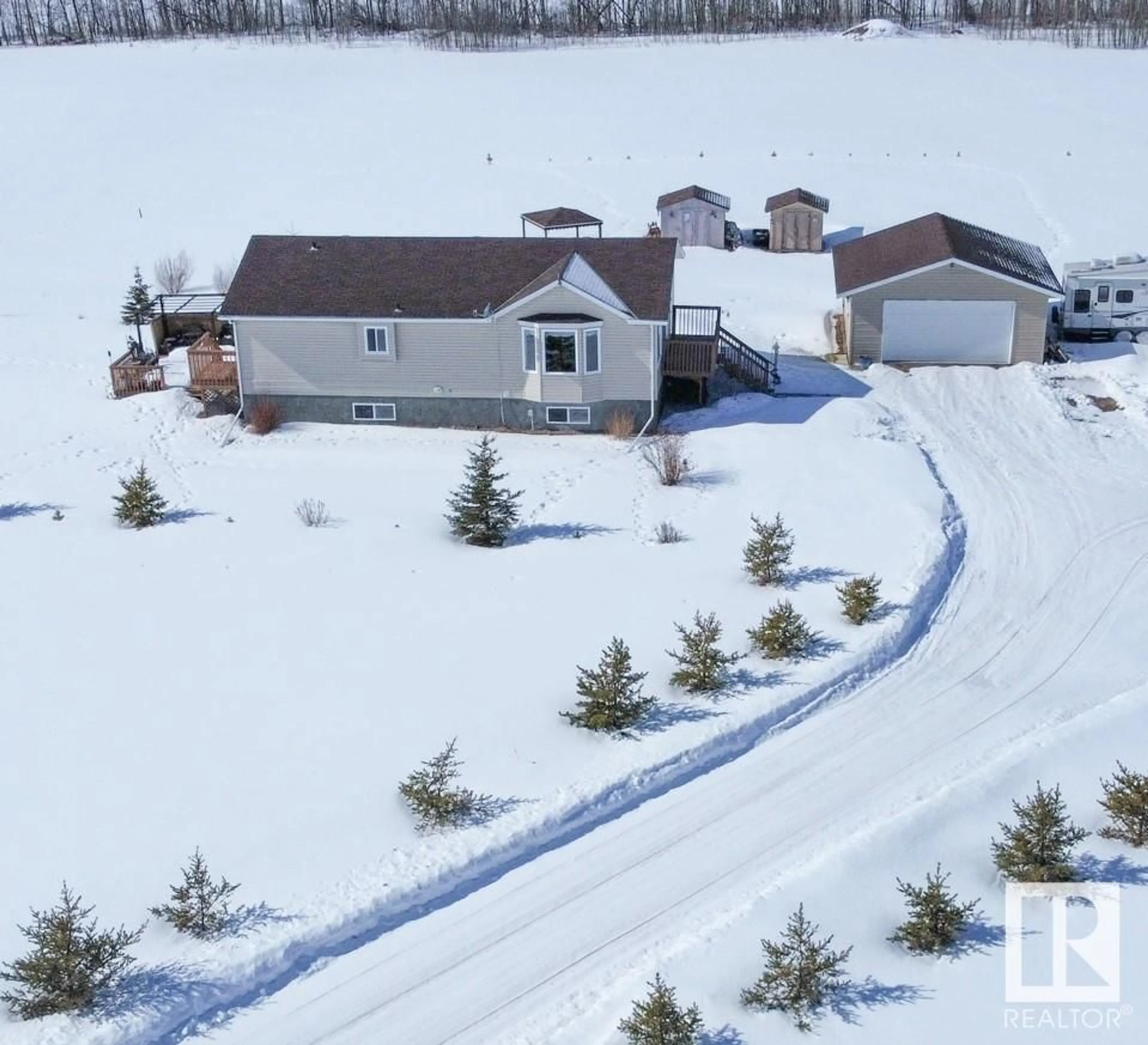 Frontside or backside of a home for #102 11312 Twp Rd 594, Rural St. Paul County Alberta T0A0C0