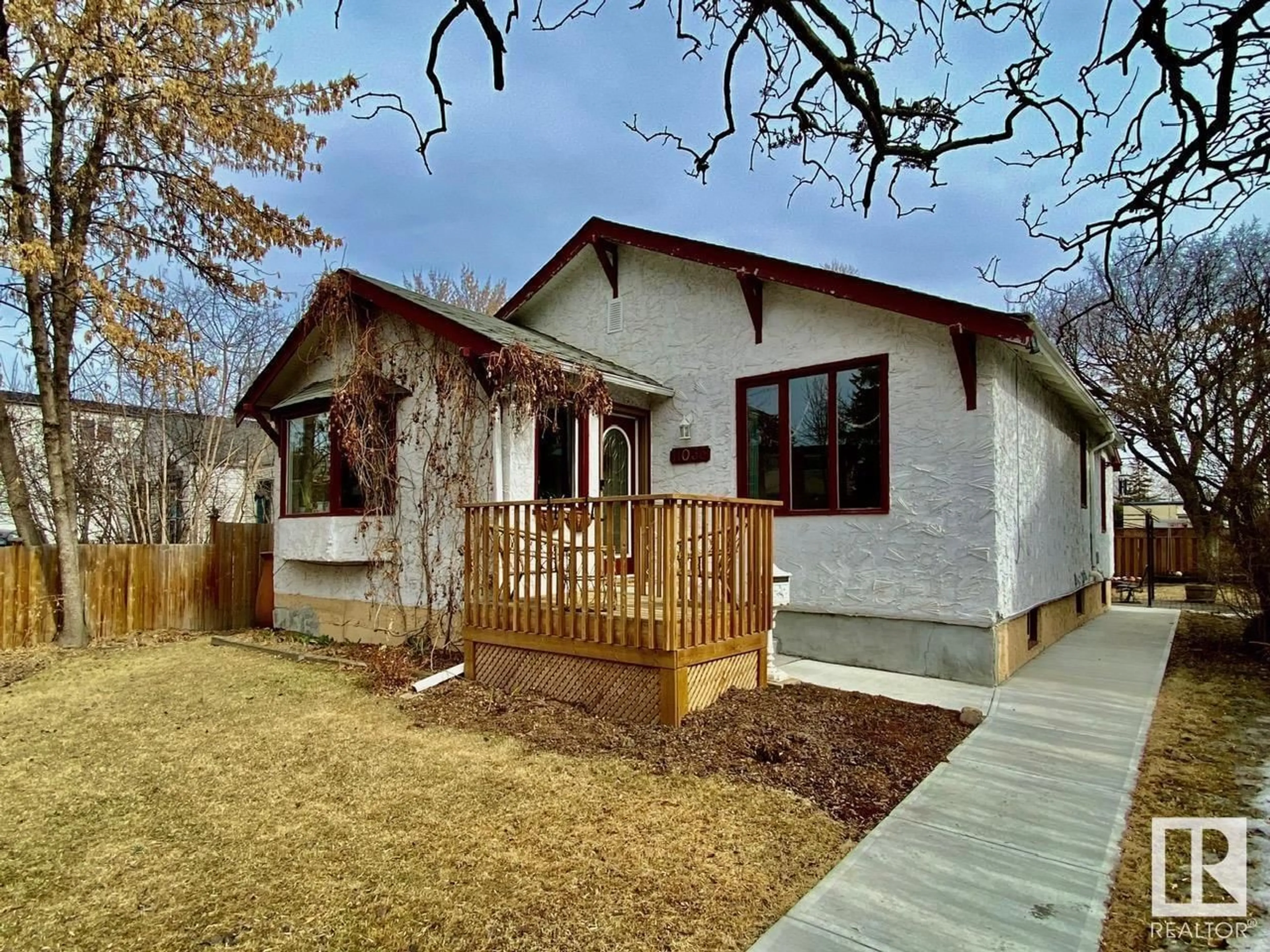 Frontside or backside of a home for 11033 128 ST NW, Edmonton Alberta T5M0W7