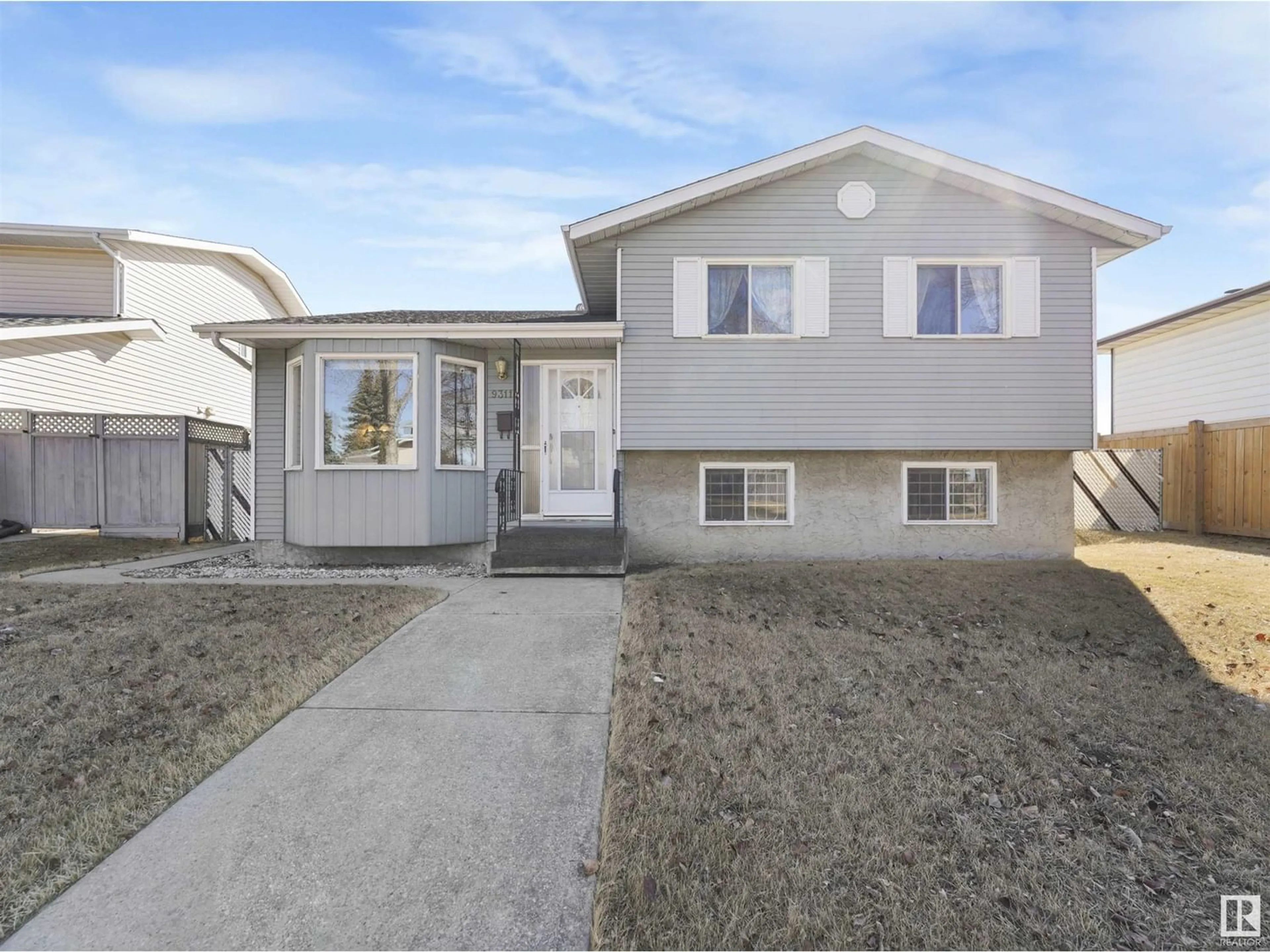 Frontside or backside of a home for 9311 168 AV NW, Edmonton Alberta T5Z1X9