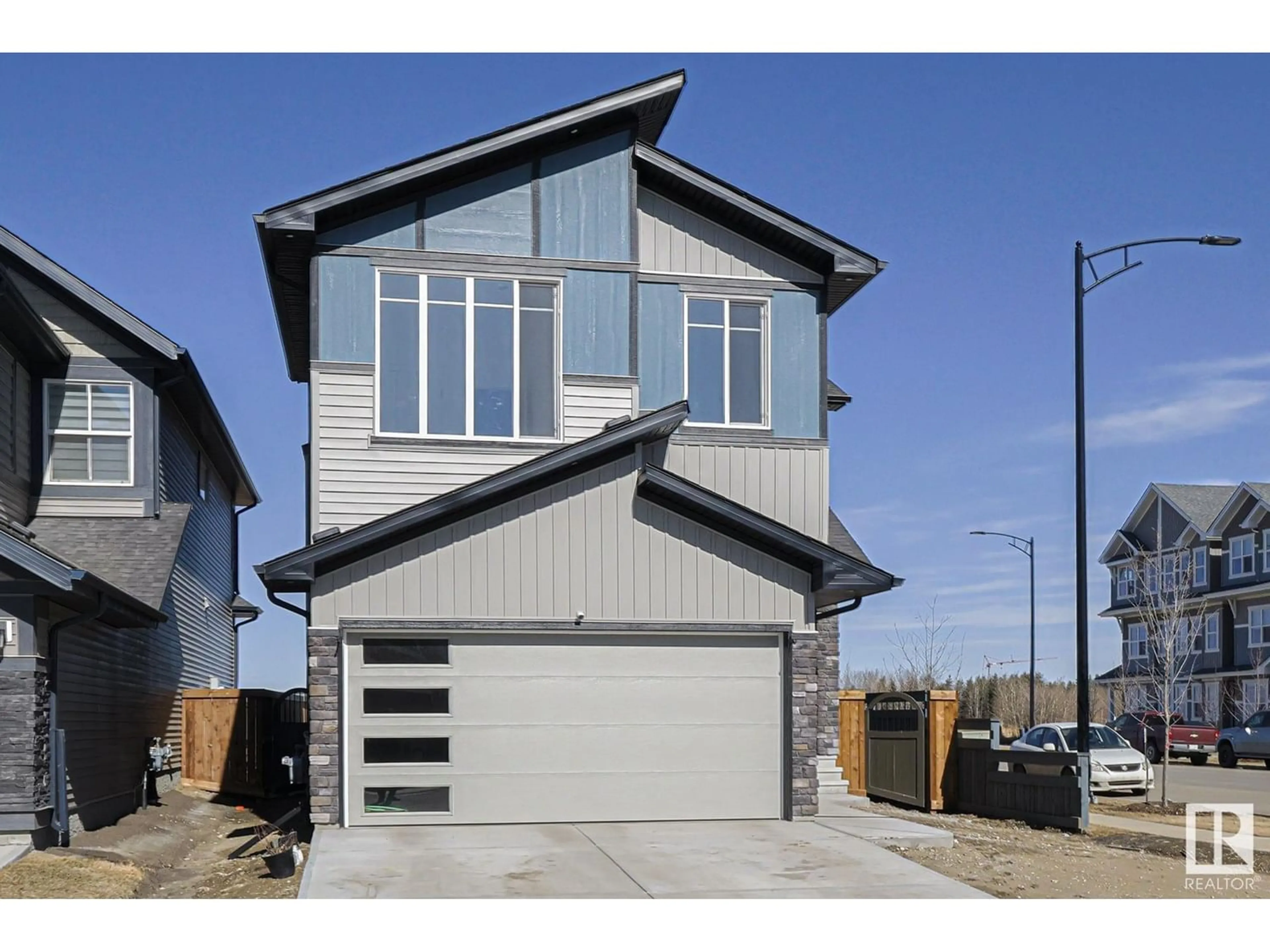 Frontside or backside of a home for 11972 34 AV SW, Edmonton Alberta T6W4Y2