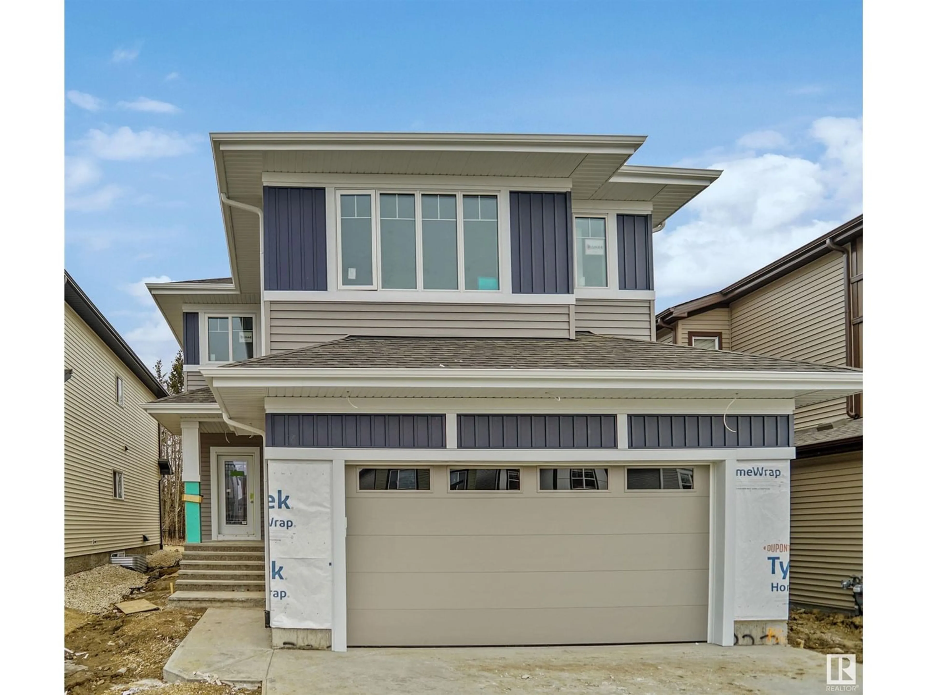 Frontside or backside of a home for 327 35 AV NW, Edmonton Alberta T6T1A4