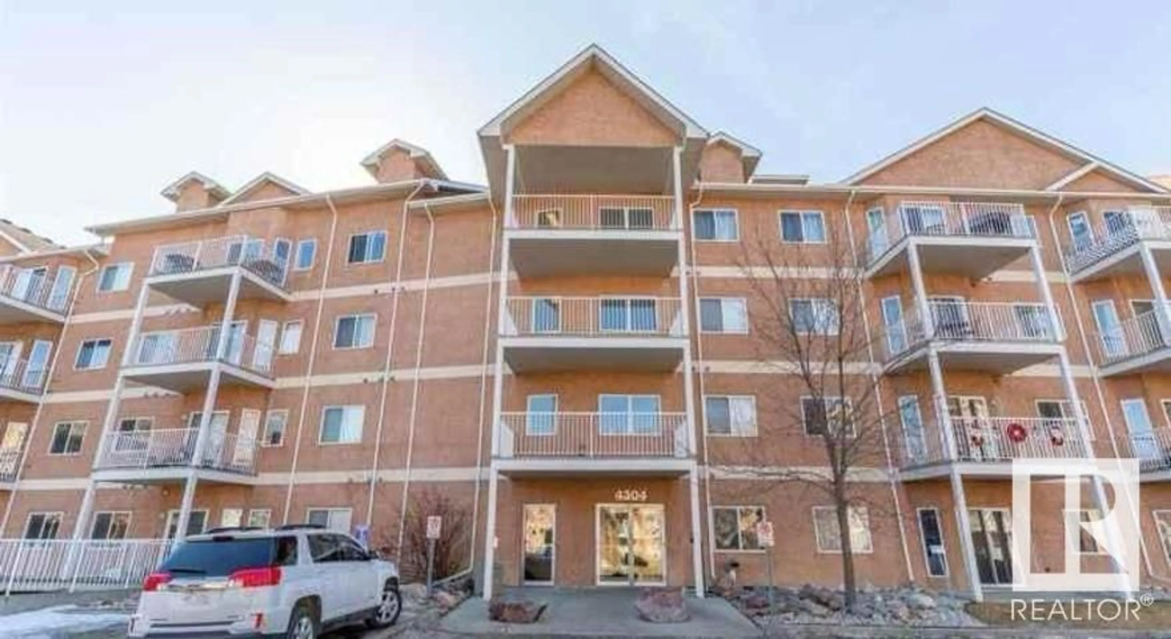 A pic from exterior of the house or condo for #122 4304 139 AV NW, Edmonton Alberta T5Y0H6