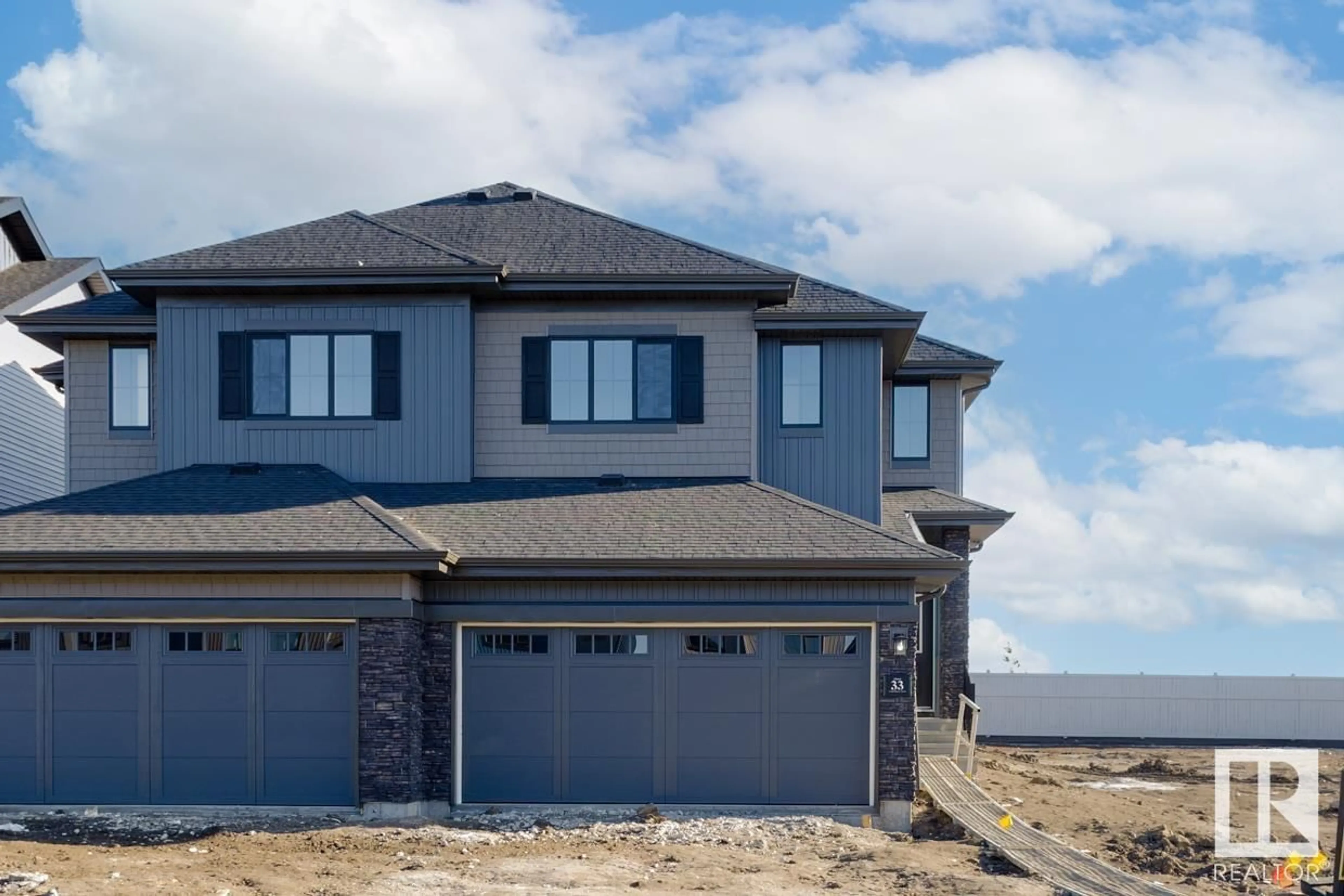 Frontside or backside of a home for 33 Chambery CR, St. Albert Alberta T8T2C1