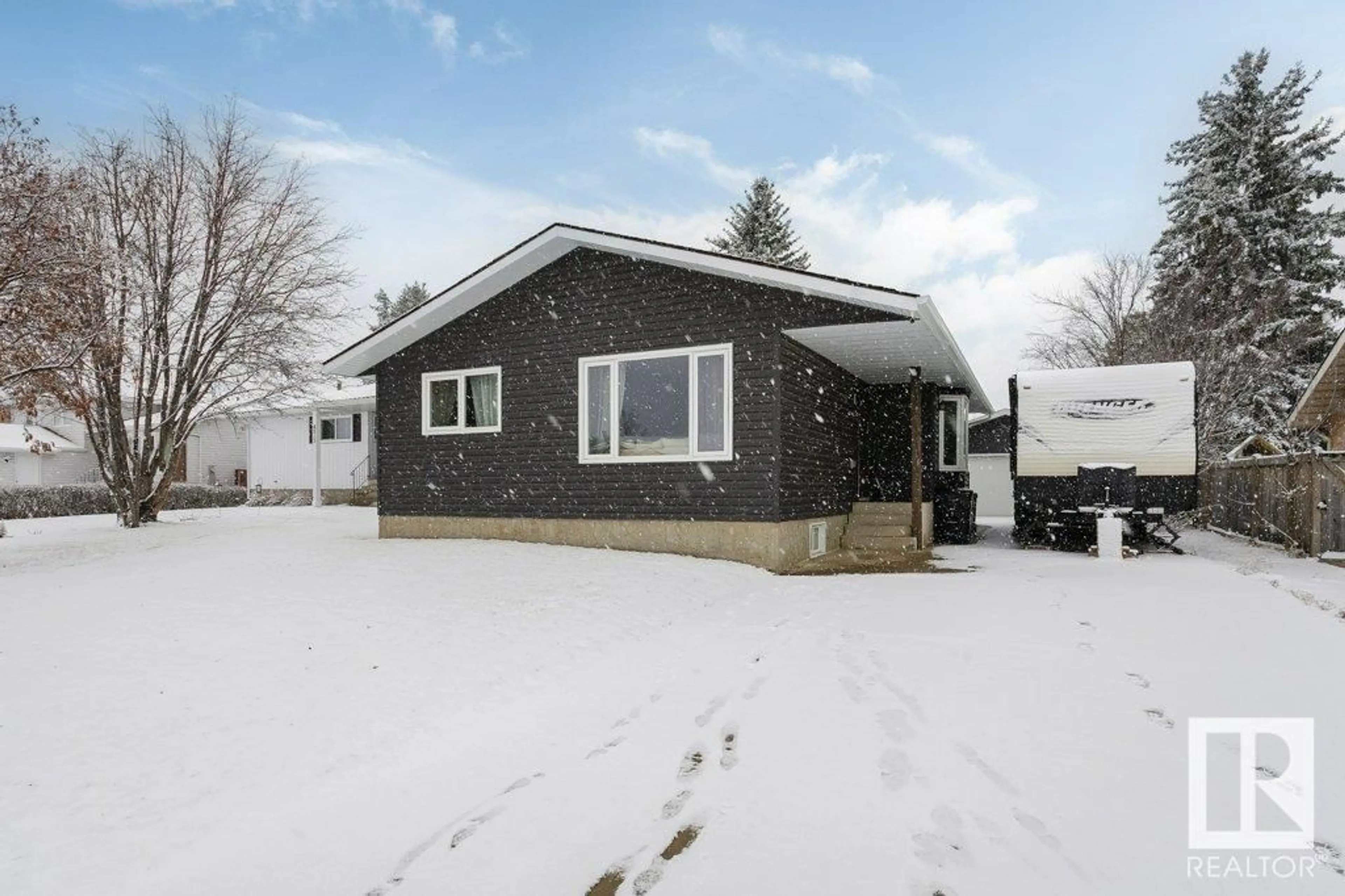 Frontside or backside of a home for 4519 22 AV NW, Edmonton Alberta T6L2T8