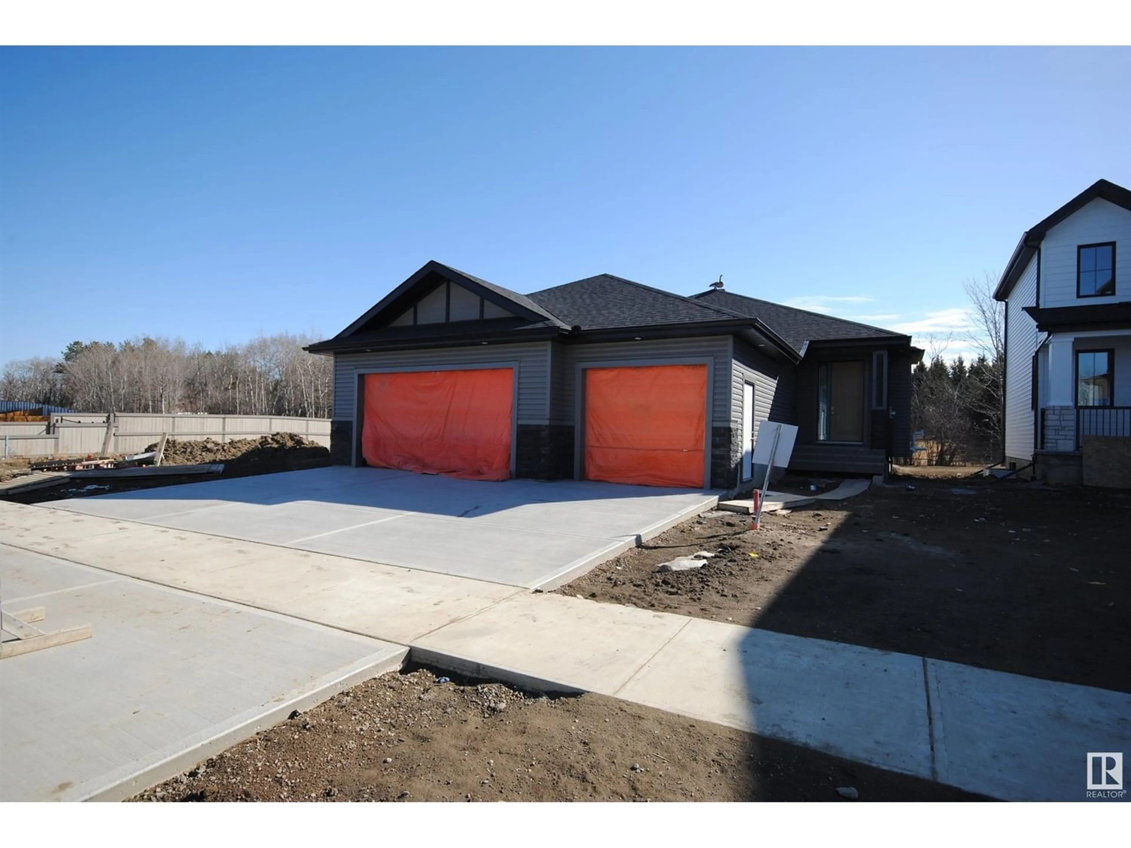 Frontside or backside of a home for 92 HARVEST CR, Ardrossan Alberta T8E0B5