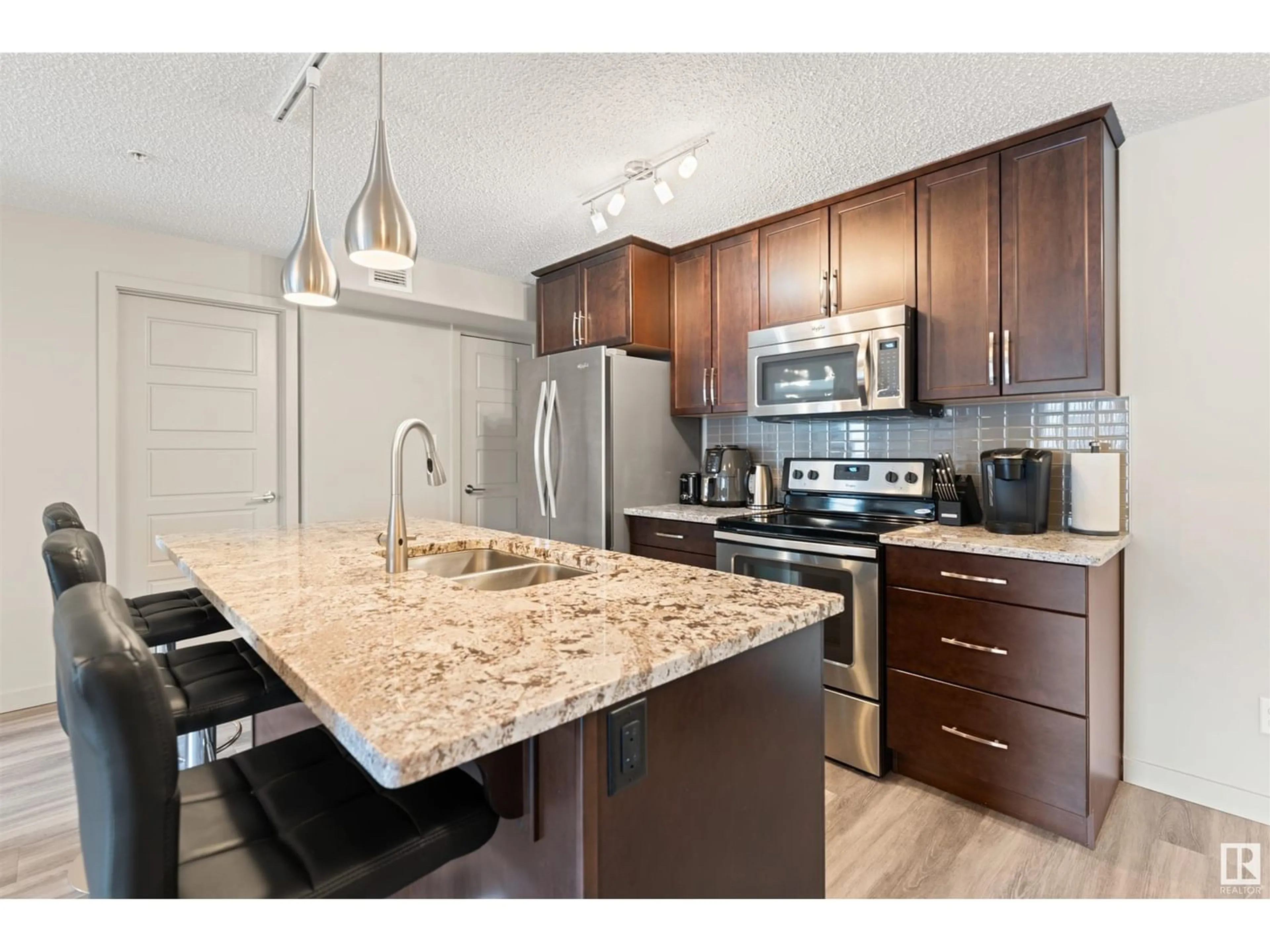 Standard kitchen for #216 5510 SCHONSEE DR NW NW, Edmonton Alberta T5Z0N9