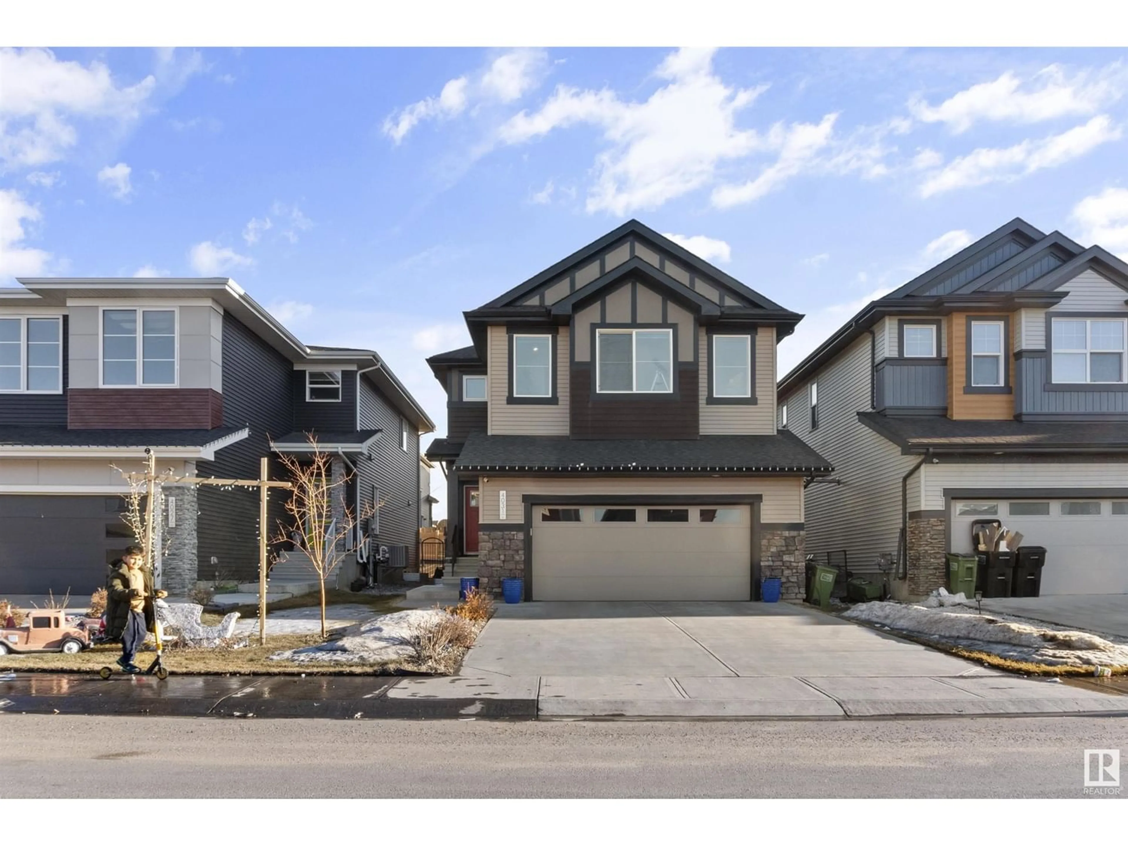 Frontside or backside of a home for 4031 5 AV SW, Edmonton Alberta T6X2J3
