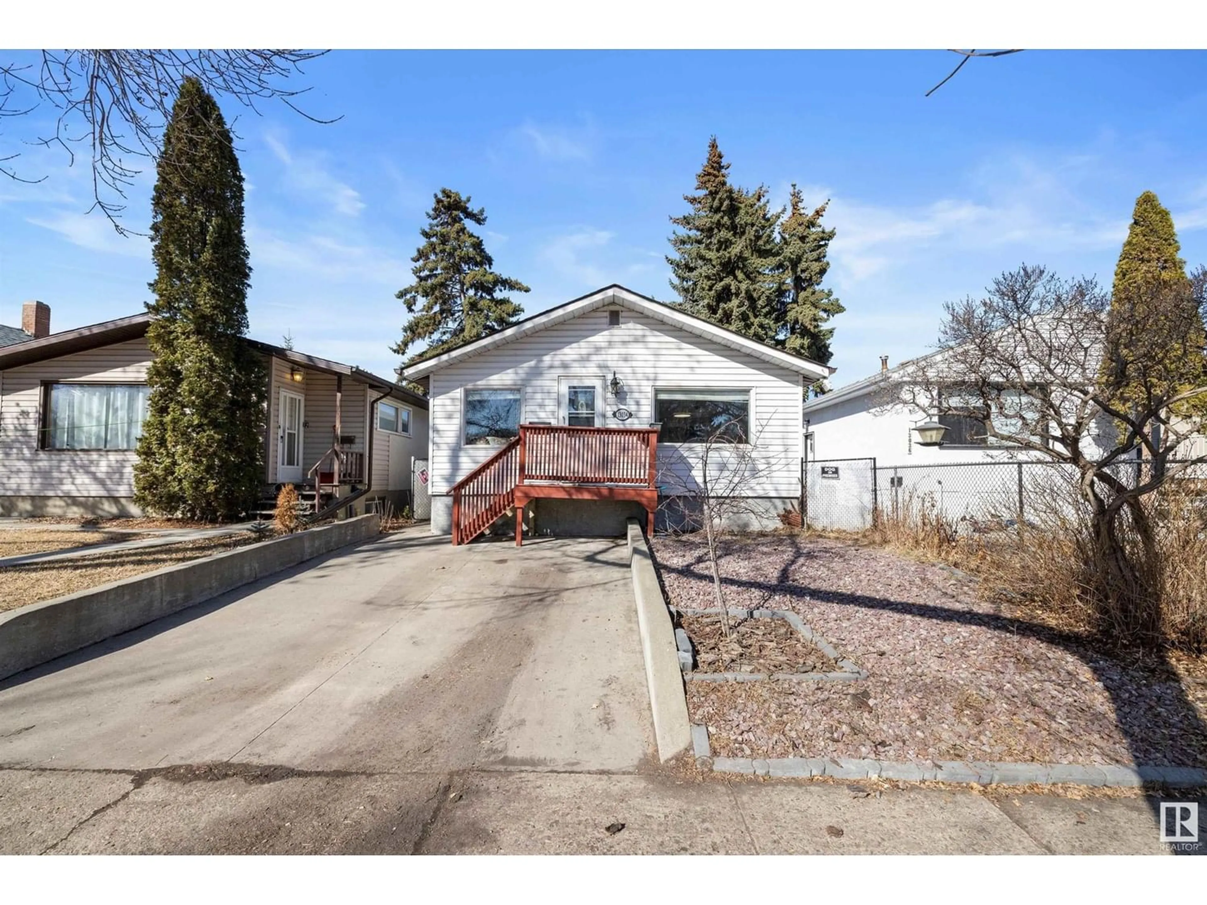 Frontside or backside of a home for 13034 65 ST NW, Edmonton Alberta T5A1A1