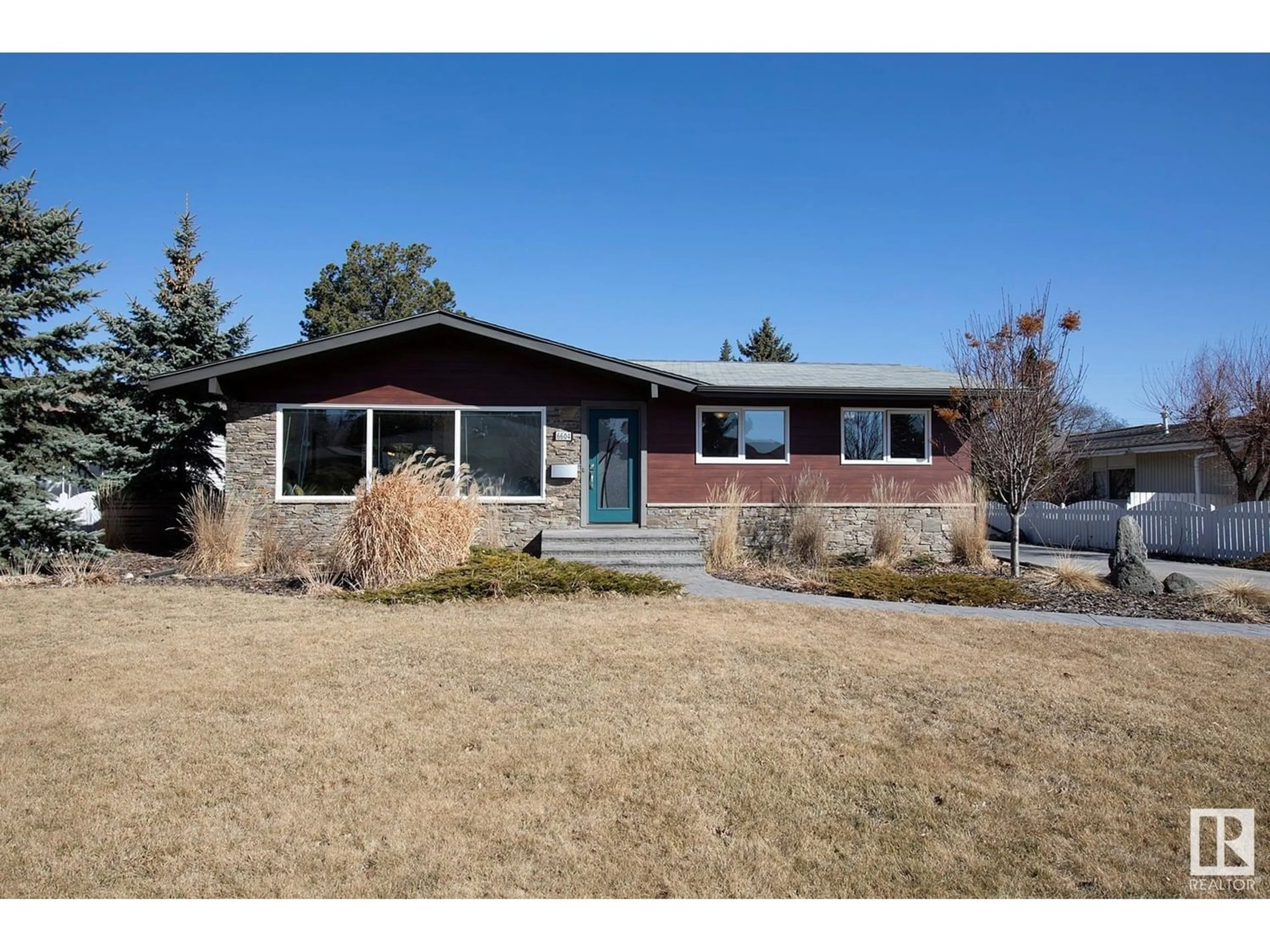 Frontside or backside of a home for 6604 108 AV NW, Edmonton Alberta T6A1P6