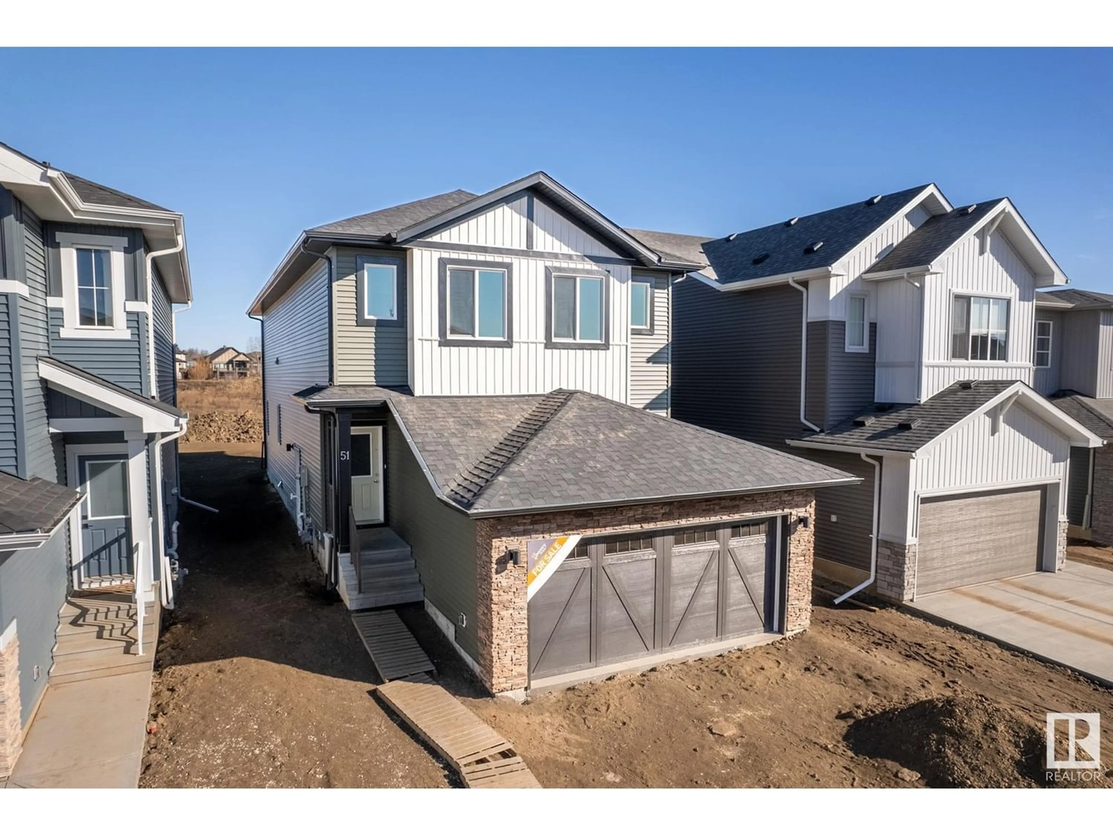 Frontside or backside of a home for 51 RASPBERRY RD, St. Albert Alberta T8N8A3