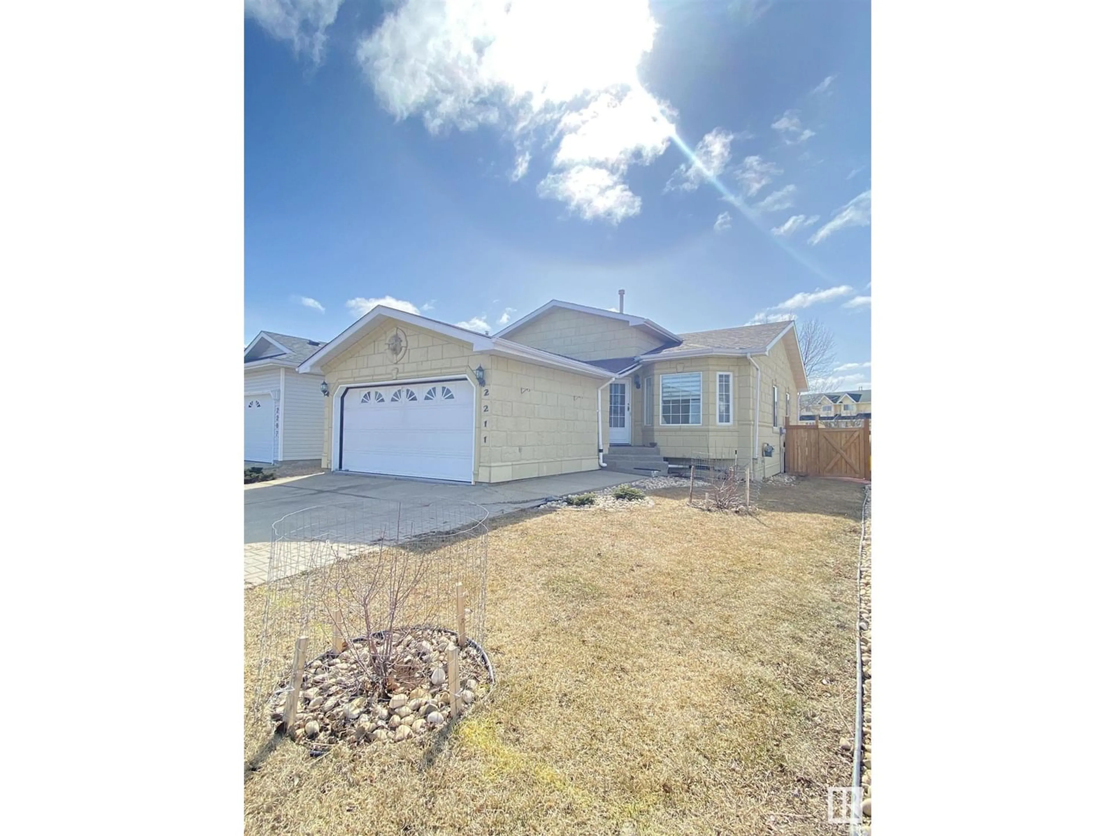 Frontside or backside of a home for 2211 133 AV NW, Edmonton Alberta T5A4Z9